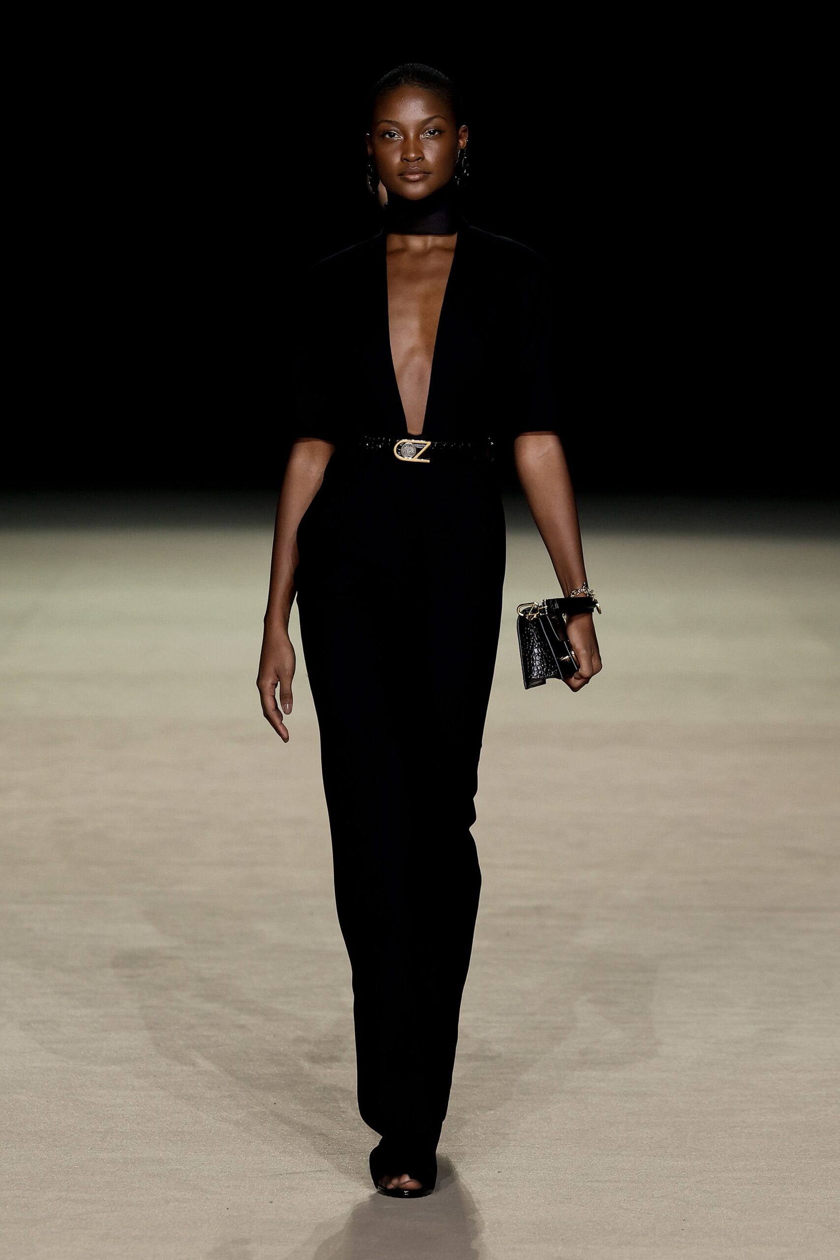 black fitted jumpsuit with accessories