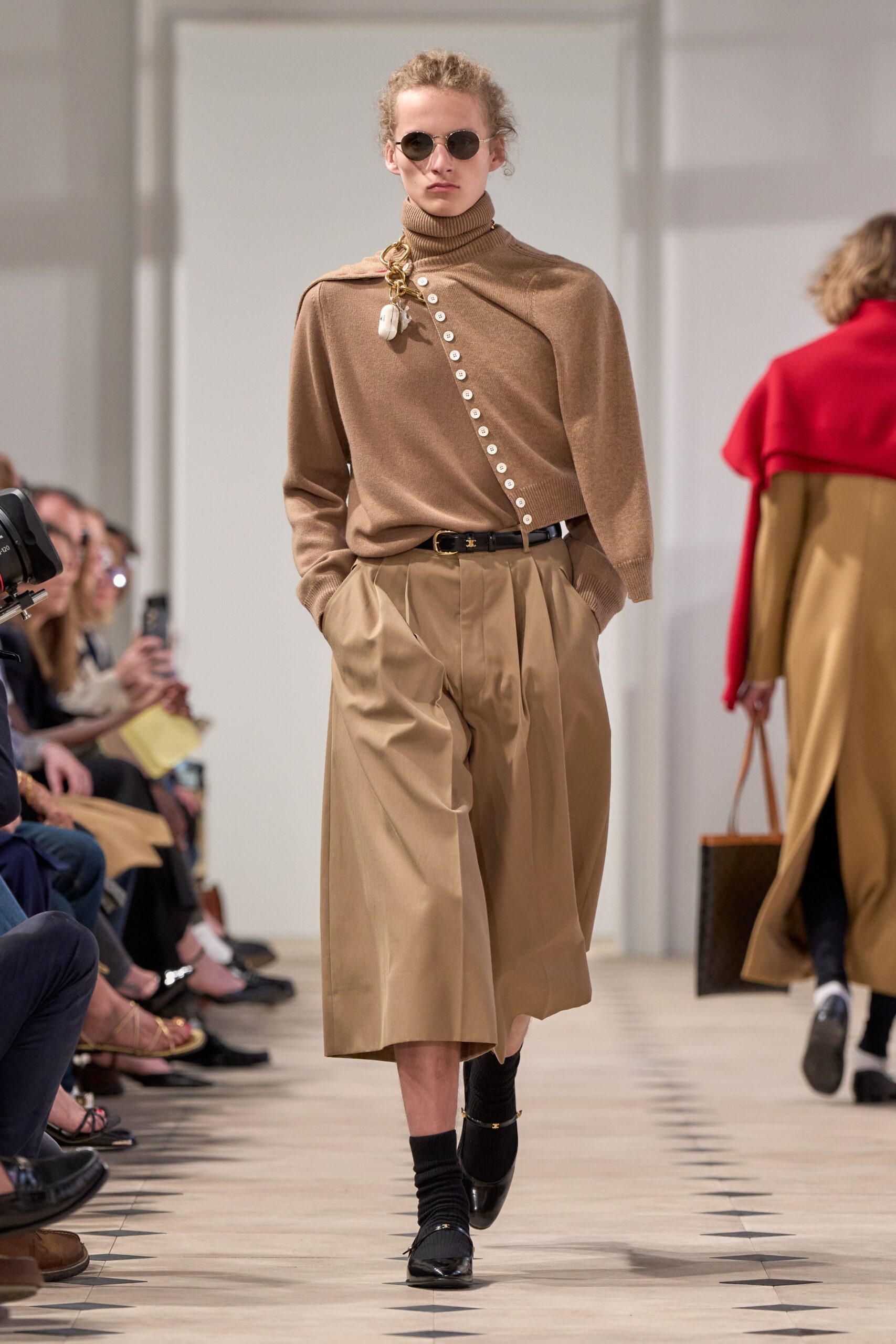 brown knit sweater and beige skirt