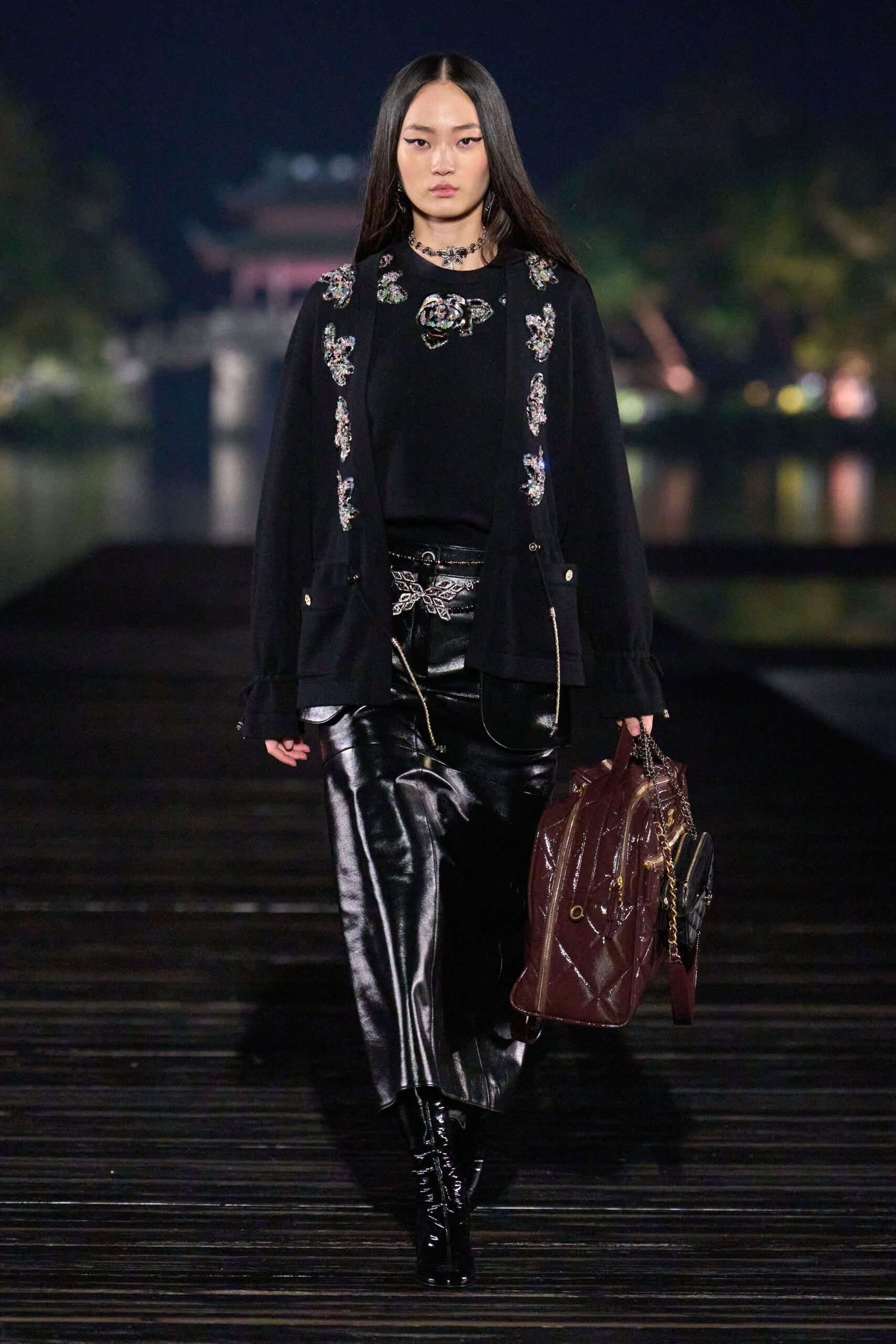 black embroidered top with leather pants