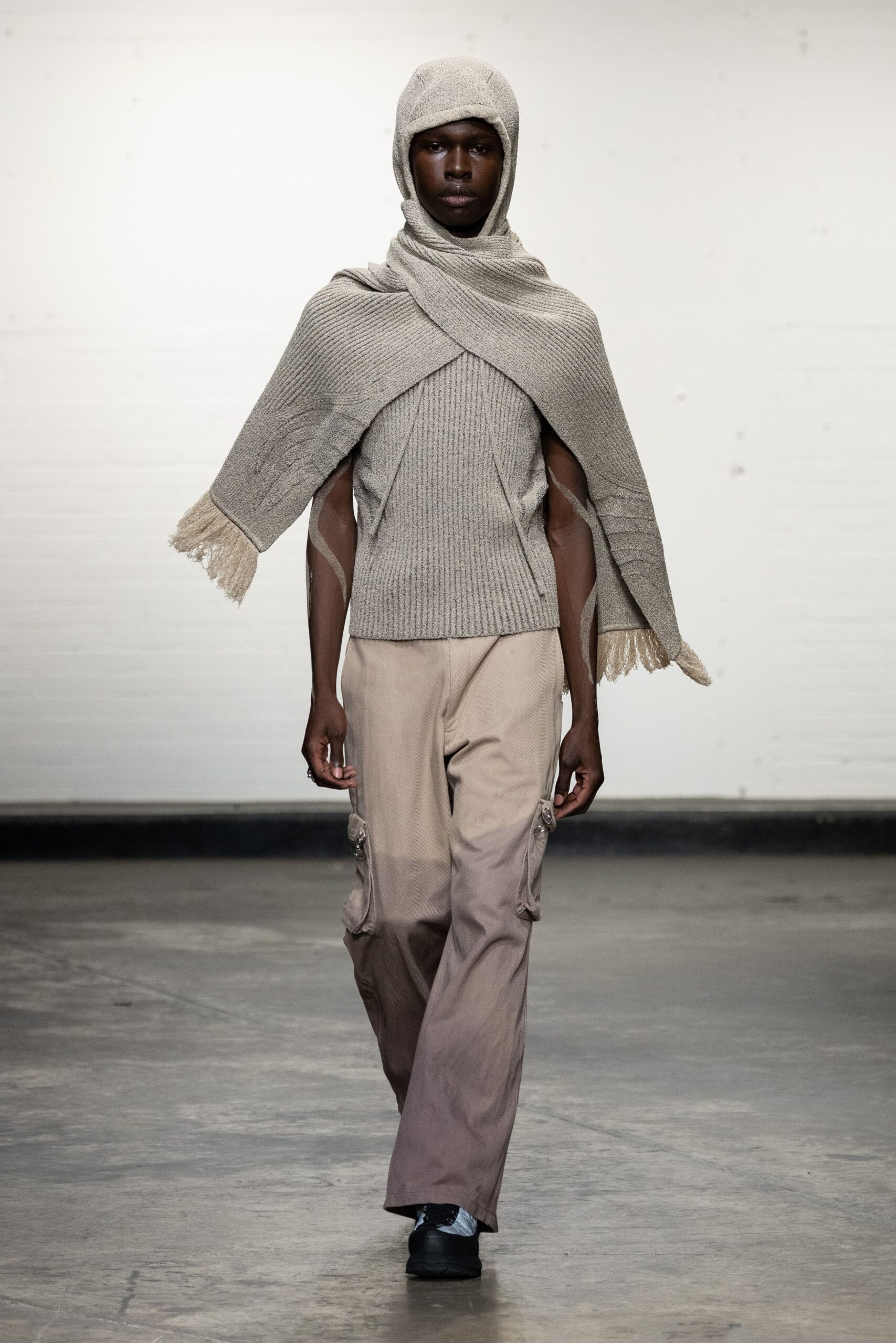 beige knit top with cargo pants