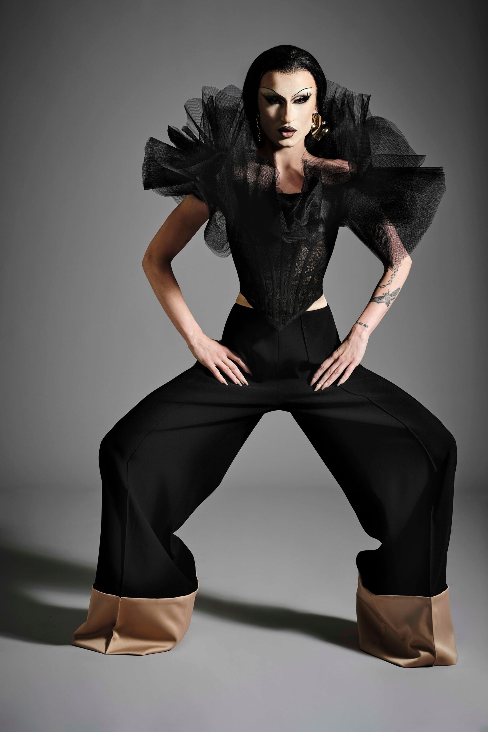 black lace fitted top with wide-leg pants