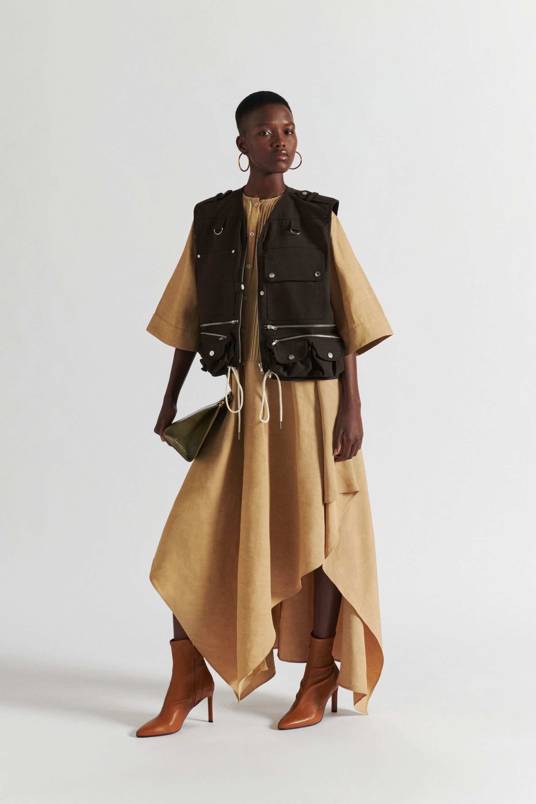 beige asymmetric dress with brown vest