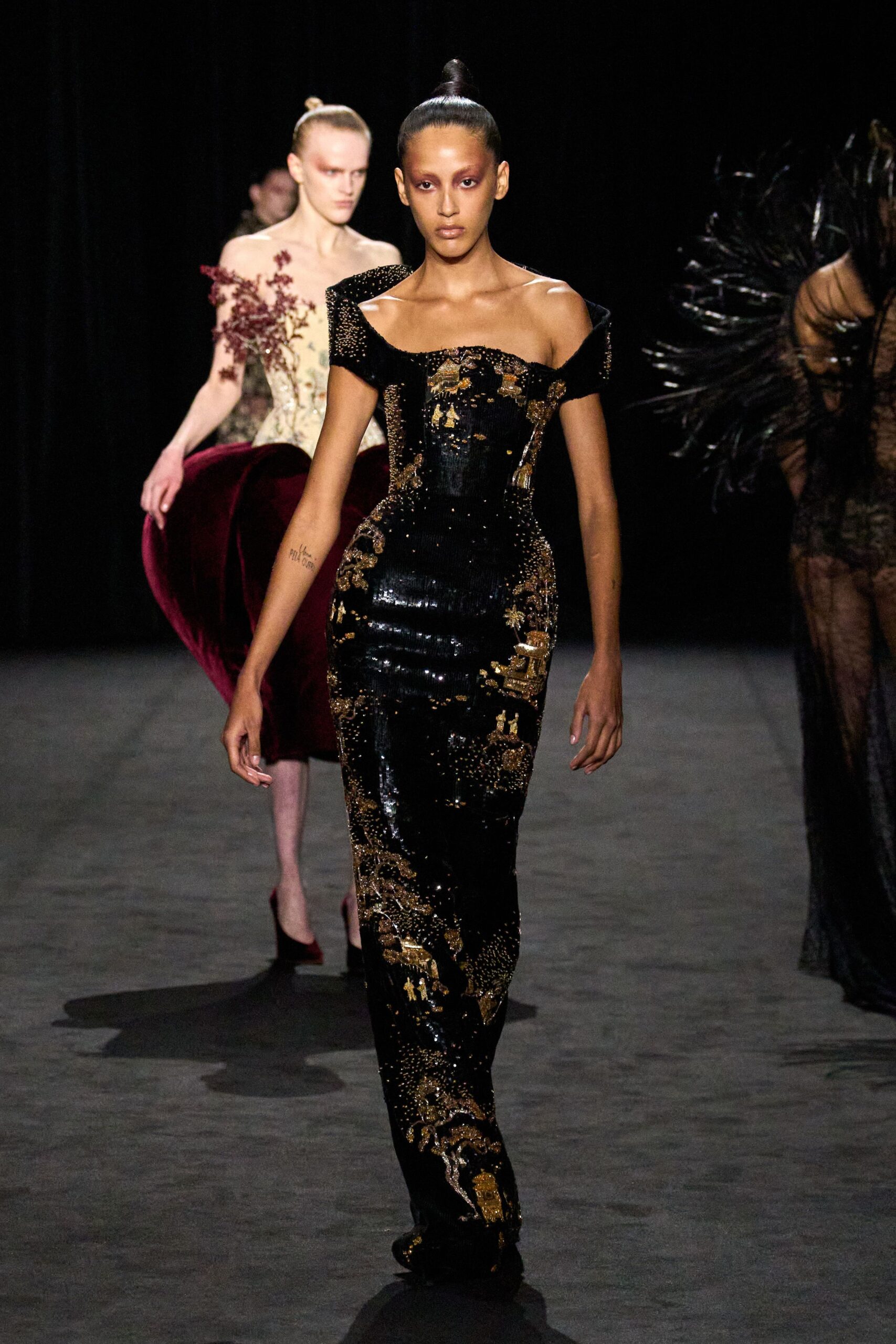 black gold sequined off-shoulder gown