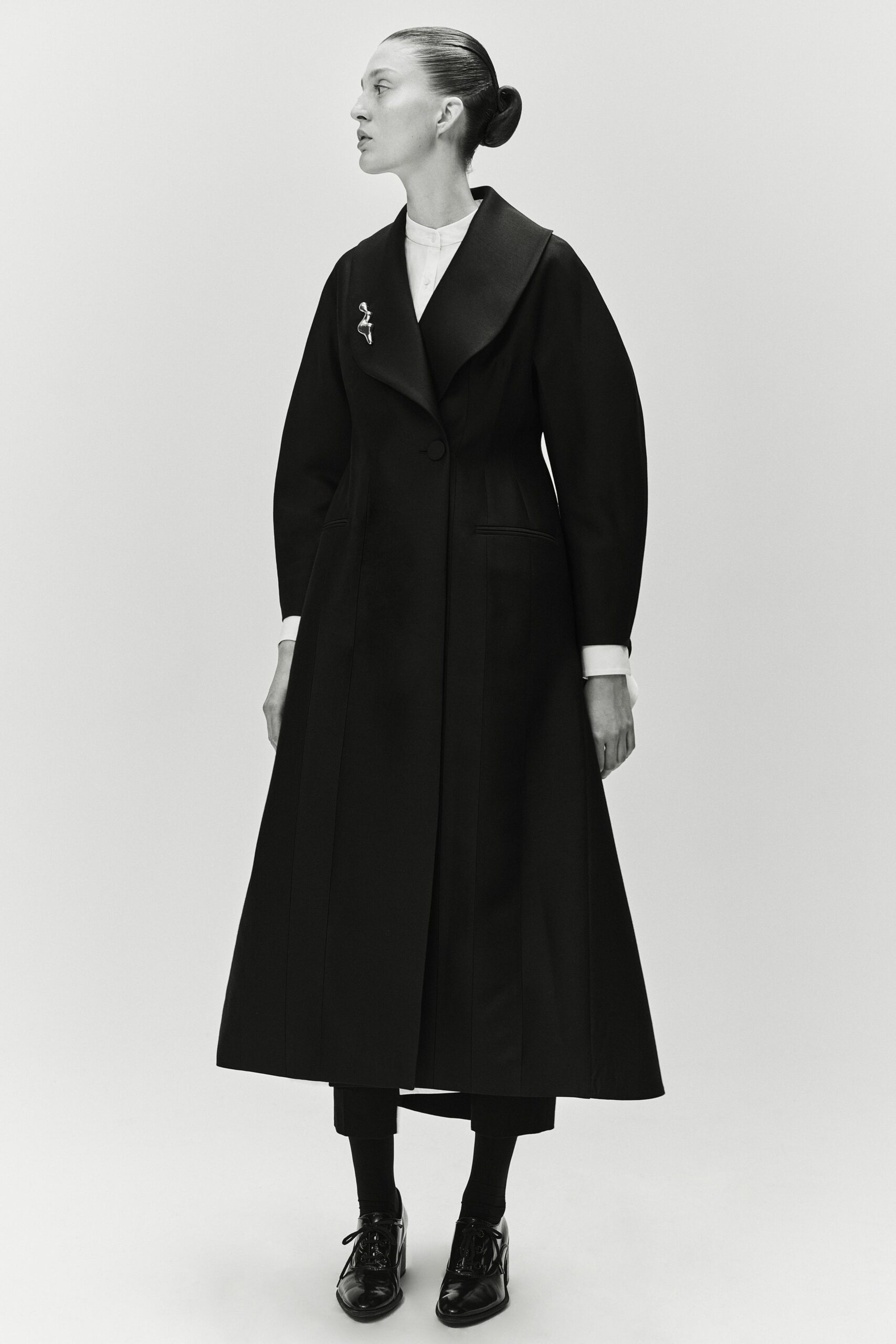black wool coat with white shirt