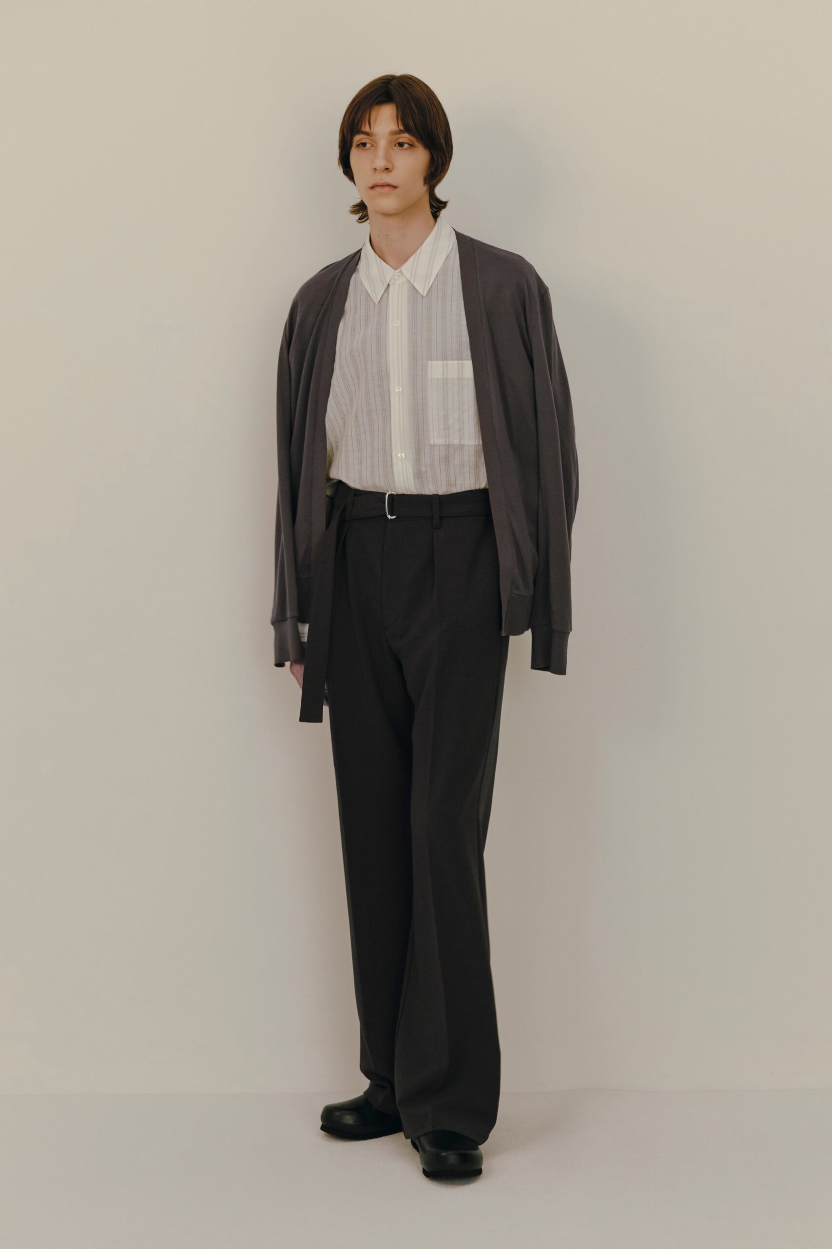 gray cardigan white shirt black pants