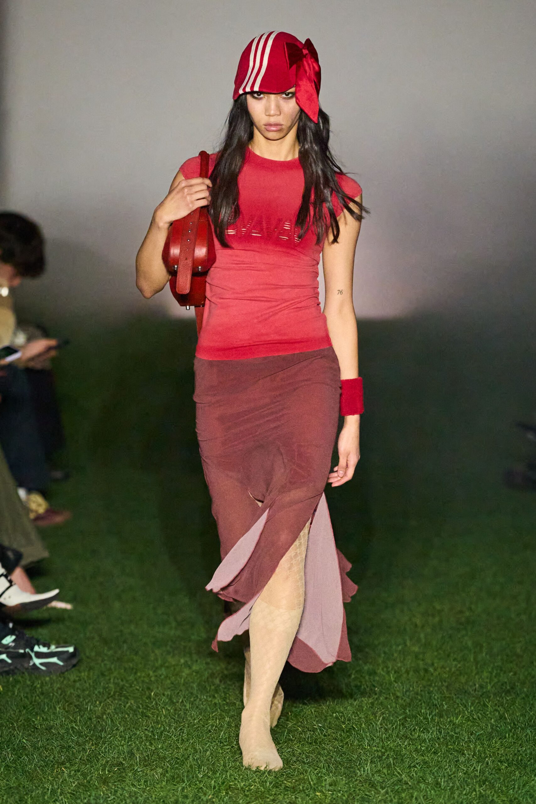 red fitted top with brown skirt