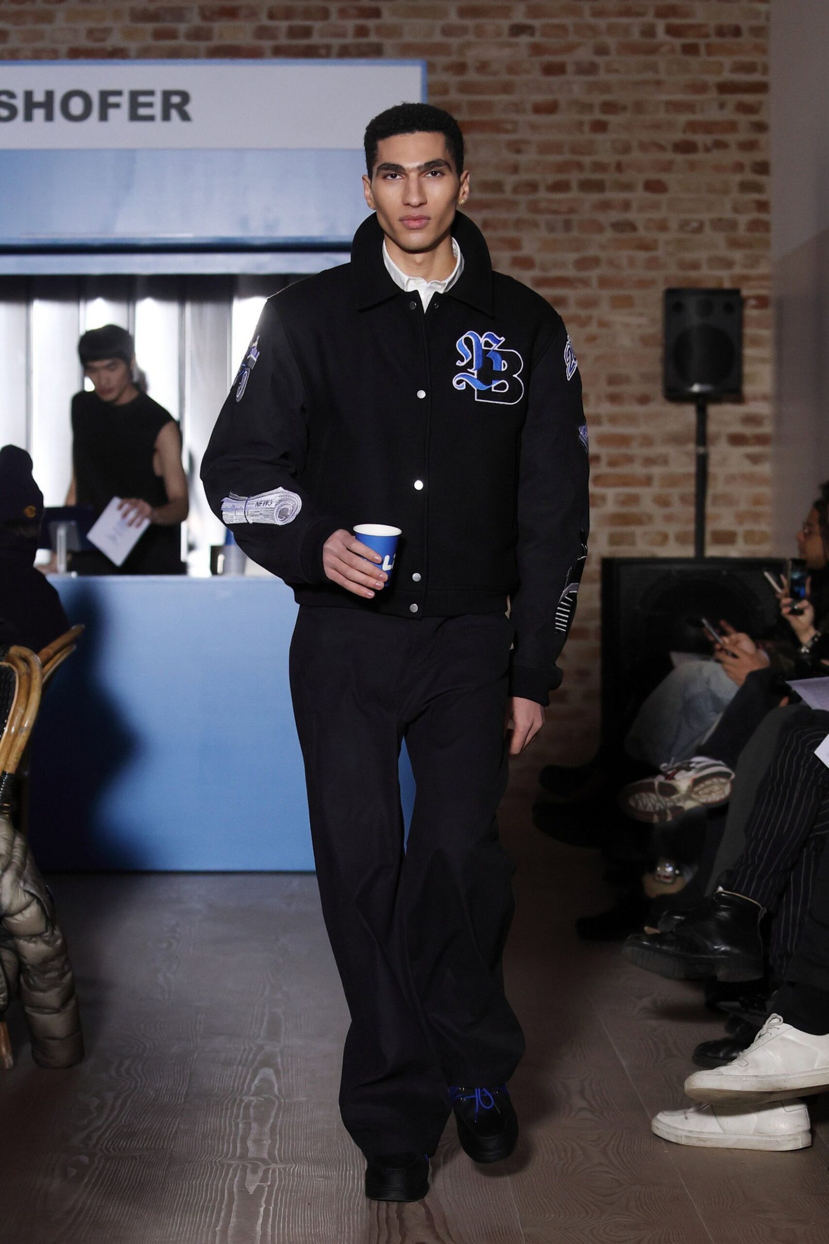 black jacket with blue pants