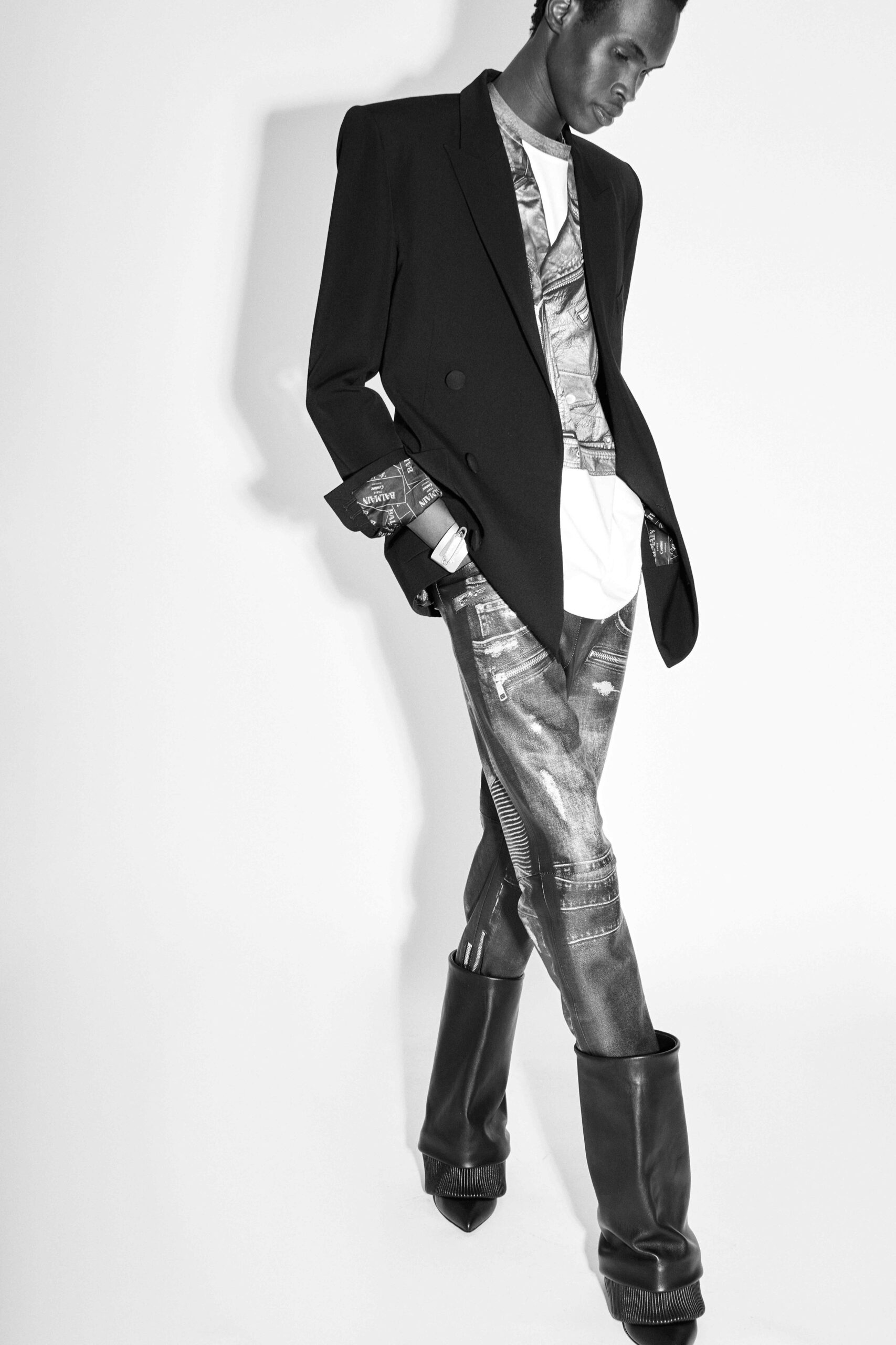black blazer with distressed pants