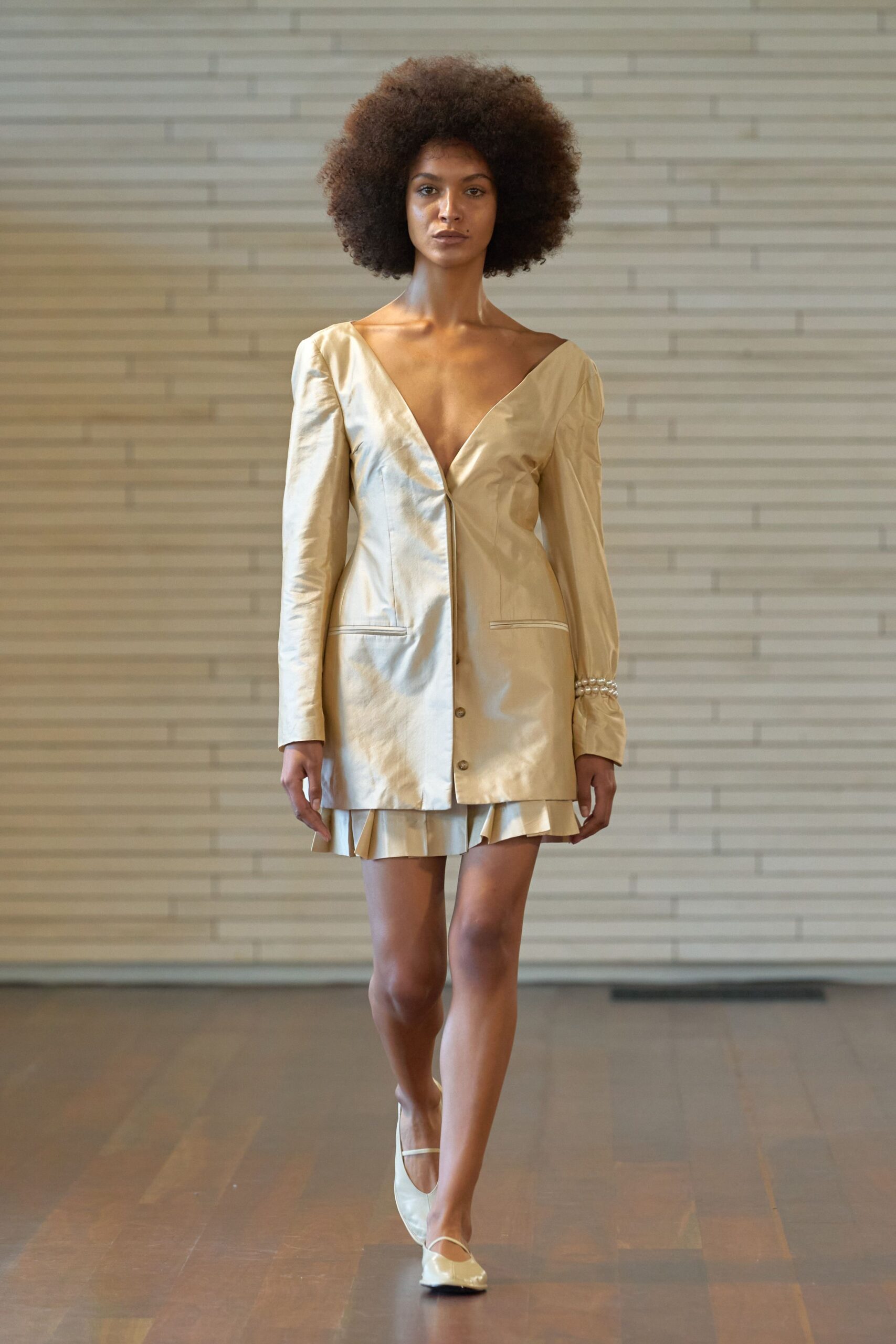 beige leather long-sleeve v-neck fitted buttoned pleated dress