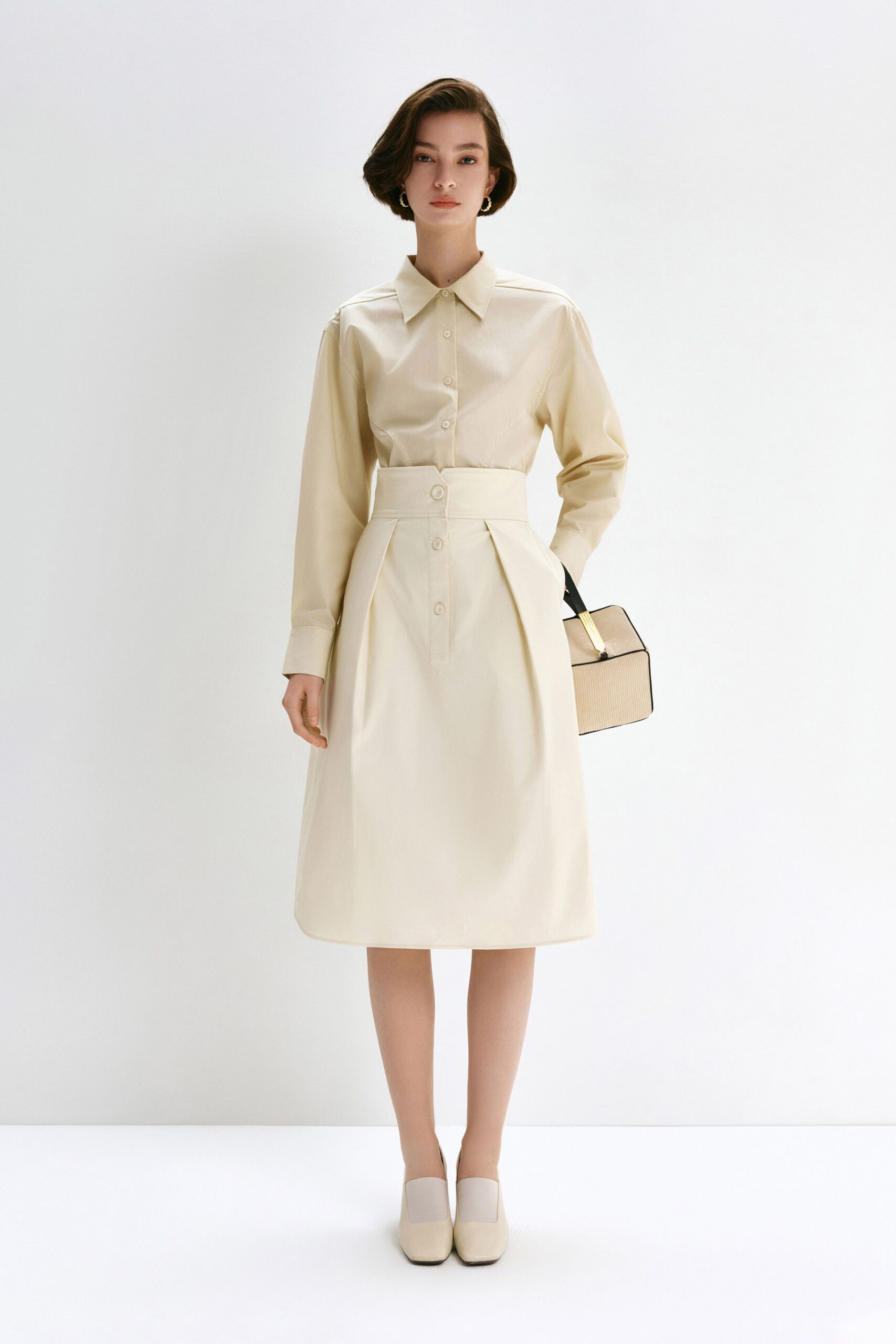 beige cotton fitted pleated buttoned midi skirt