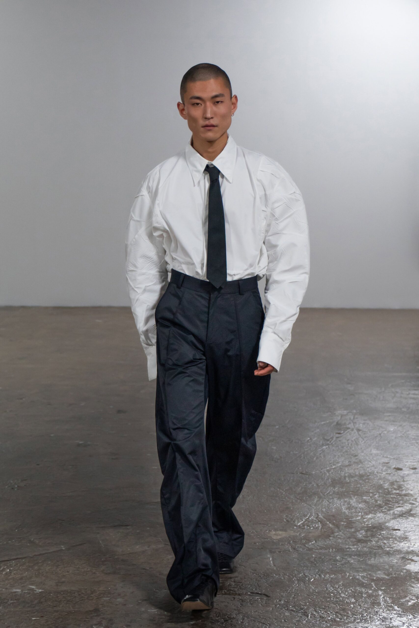 oversized white shirt with tailored black pants