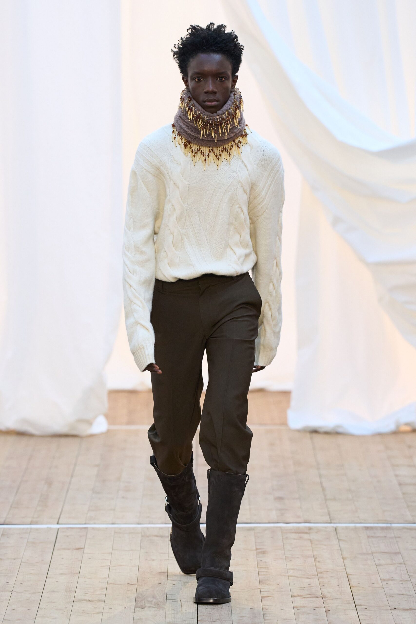 white wool sweater with brown pants