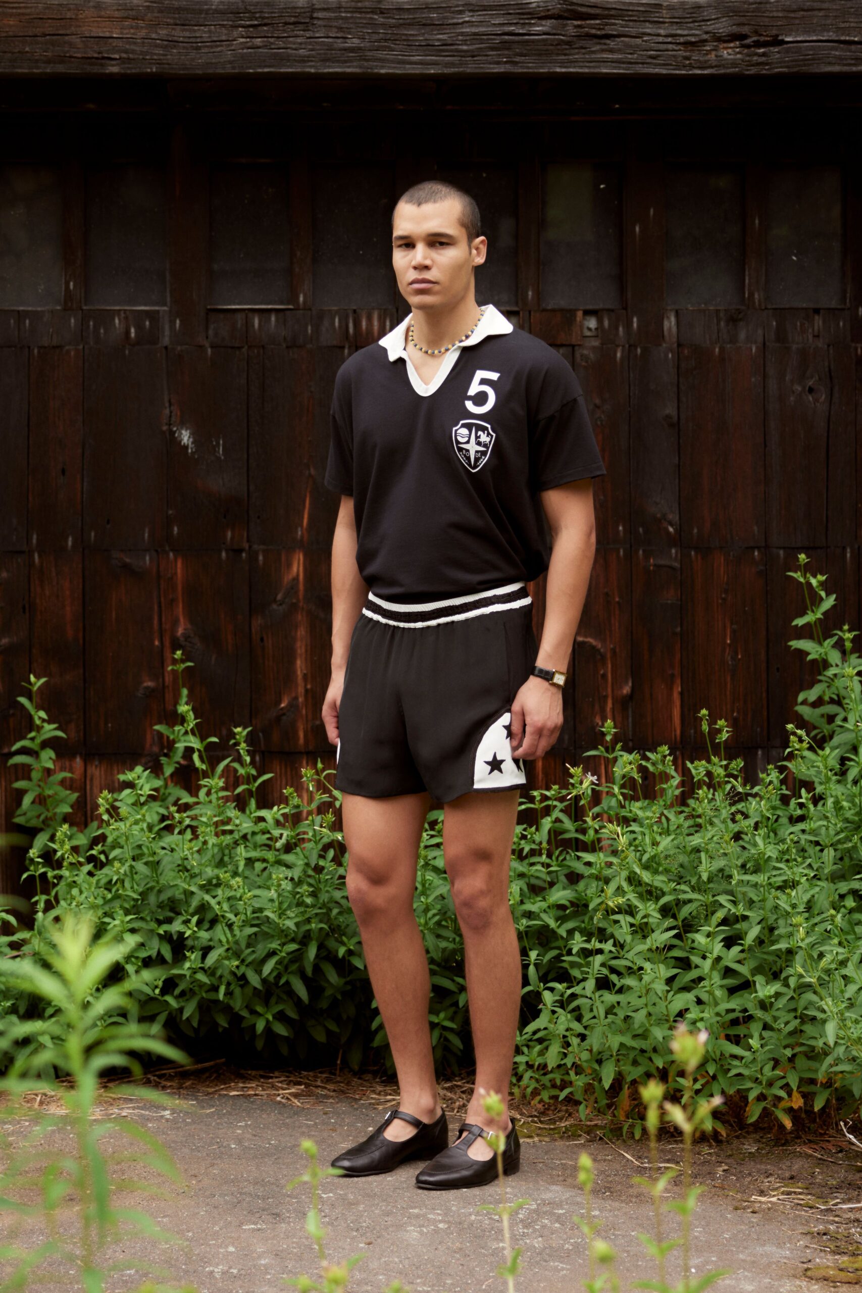 black fitted t-shirt and shorts