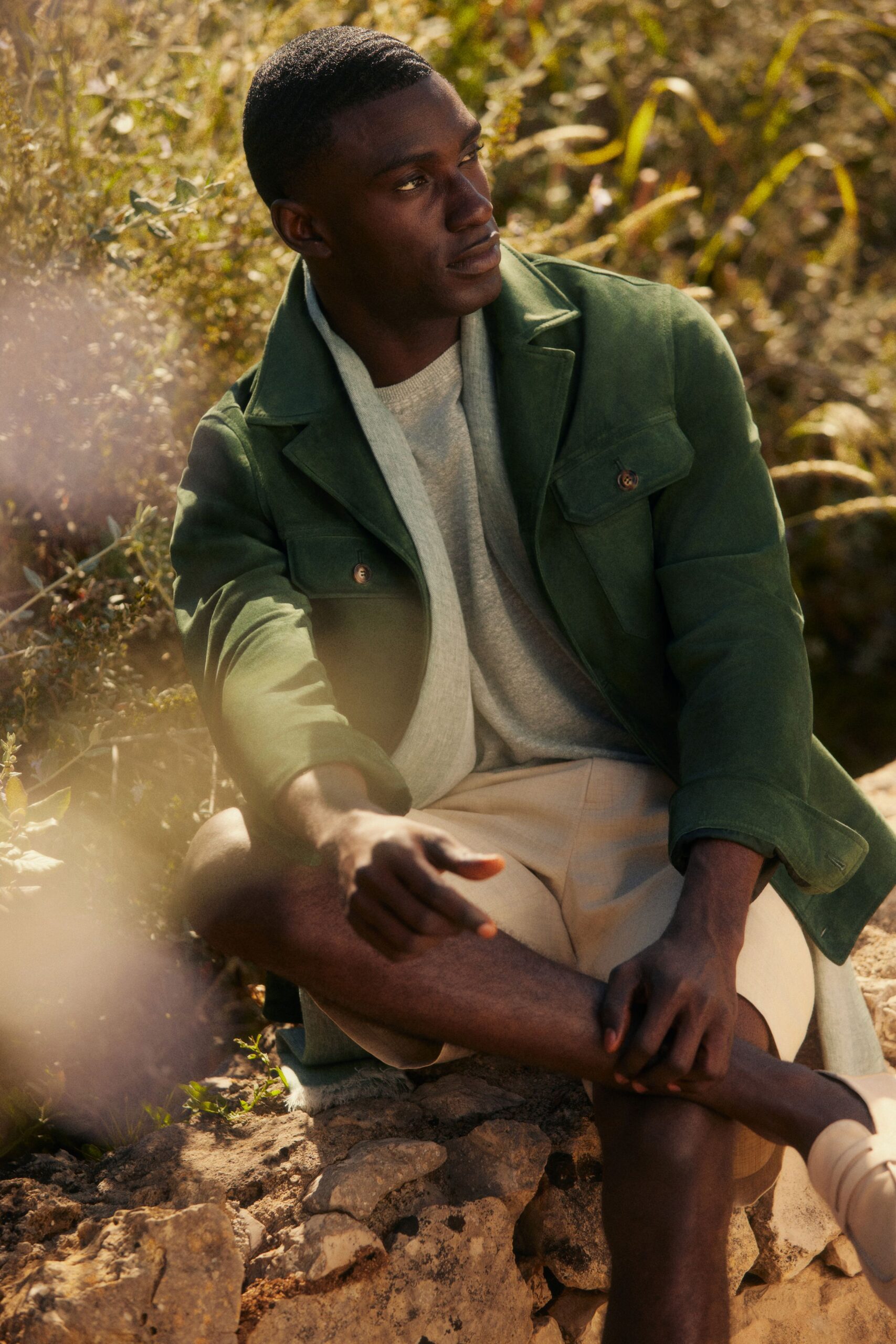 green suede long-sleeve collared structured buttoned pockets jacket