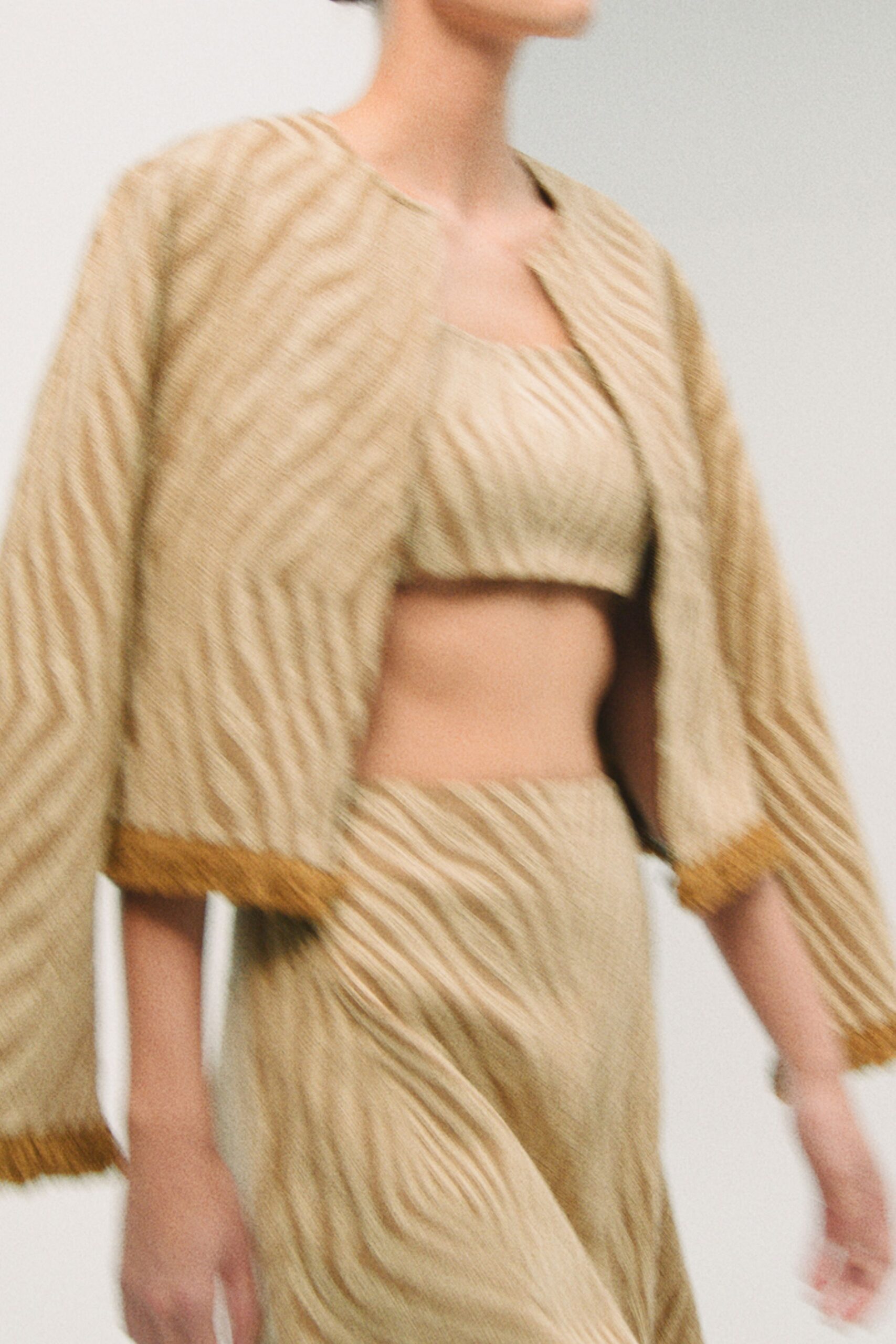 beige silk long-sleeve collared relaxed fringed jacket