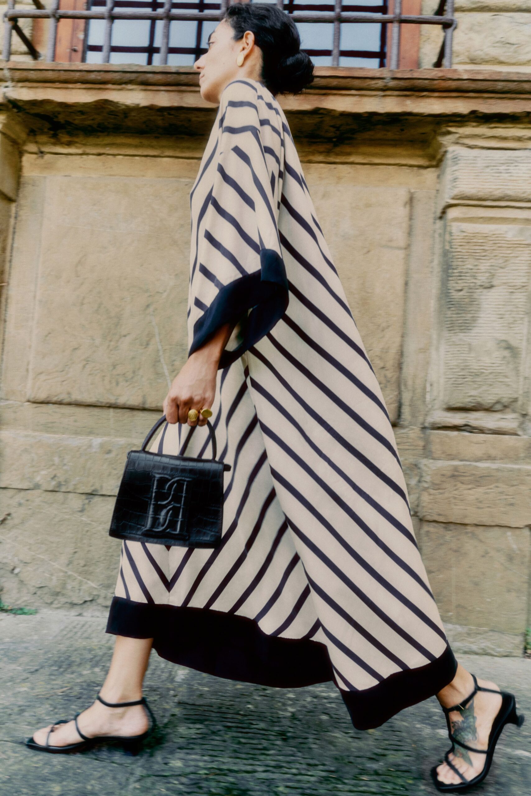 striped maxi dress with black accessories