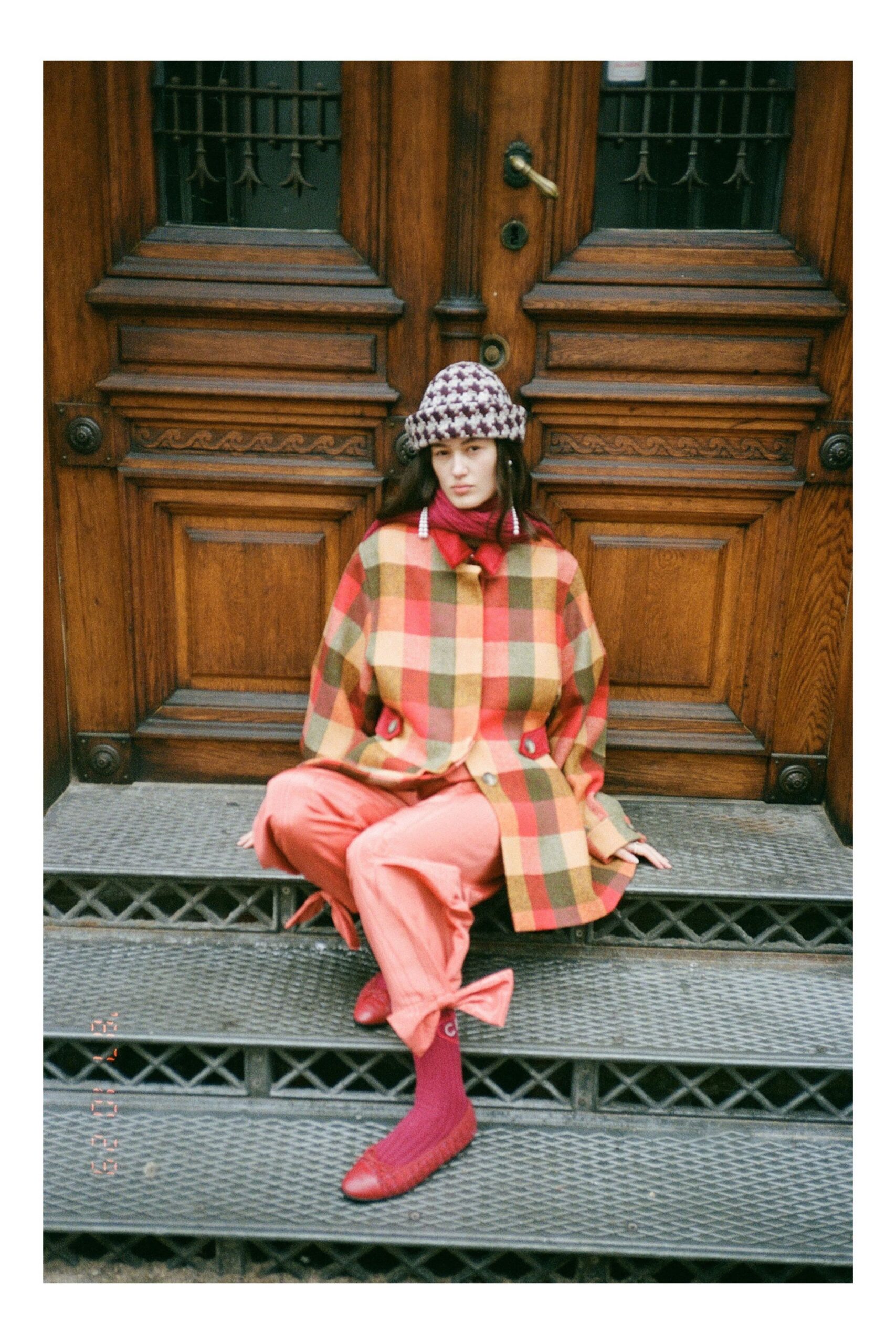 checked coat with relaxed pants