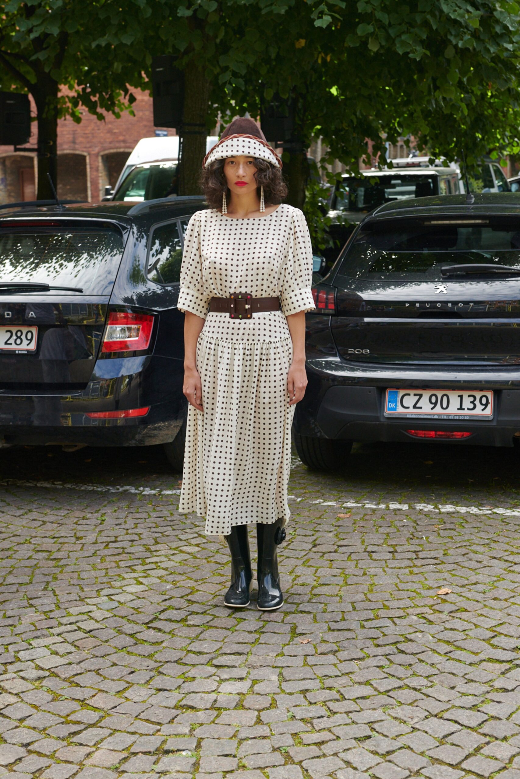 beige polka-dot midi dress with boots
