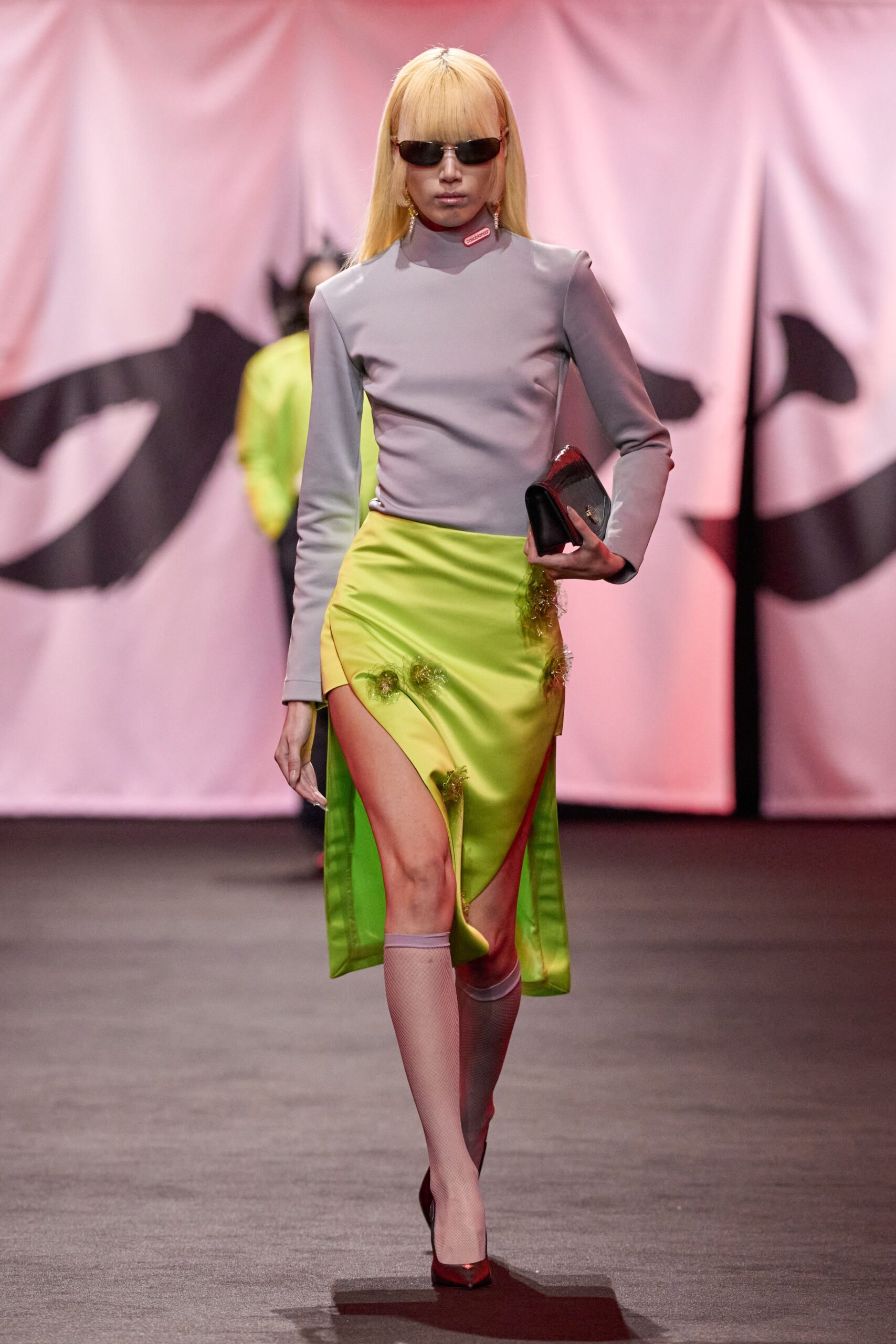gray fitted top with green skirt