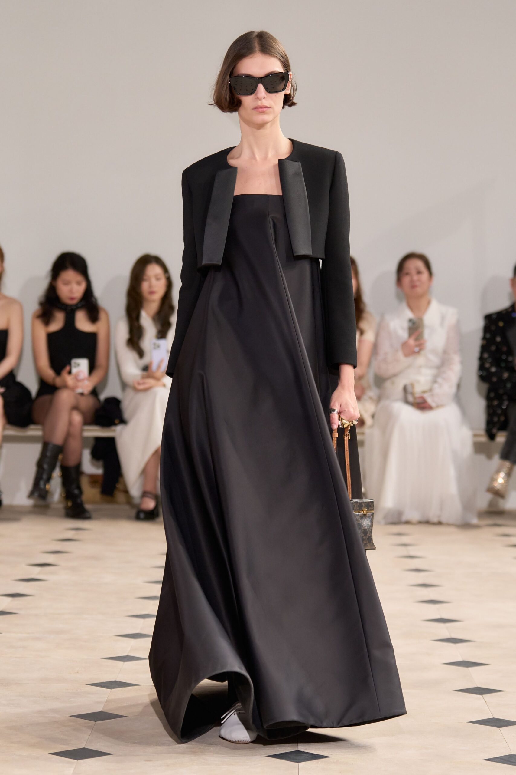 black draped dress with jacket