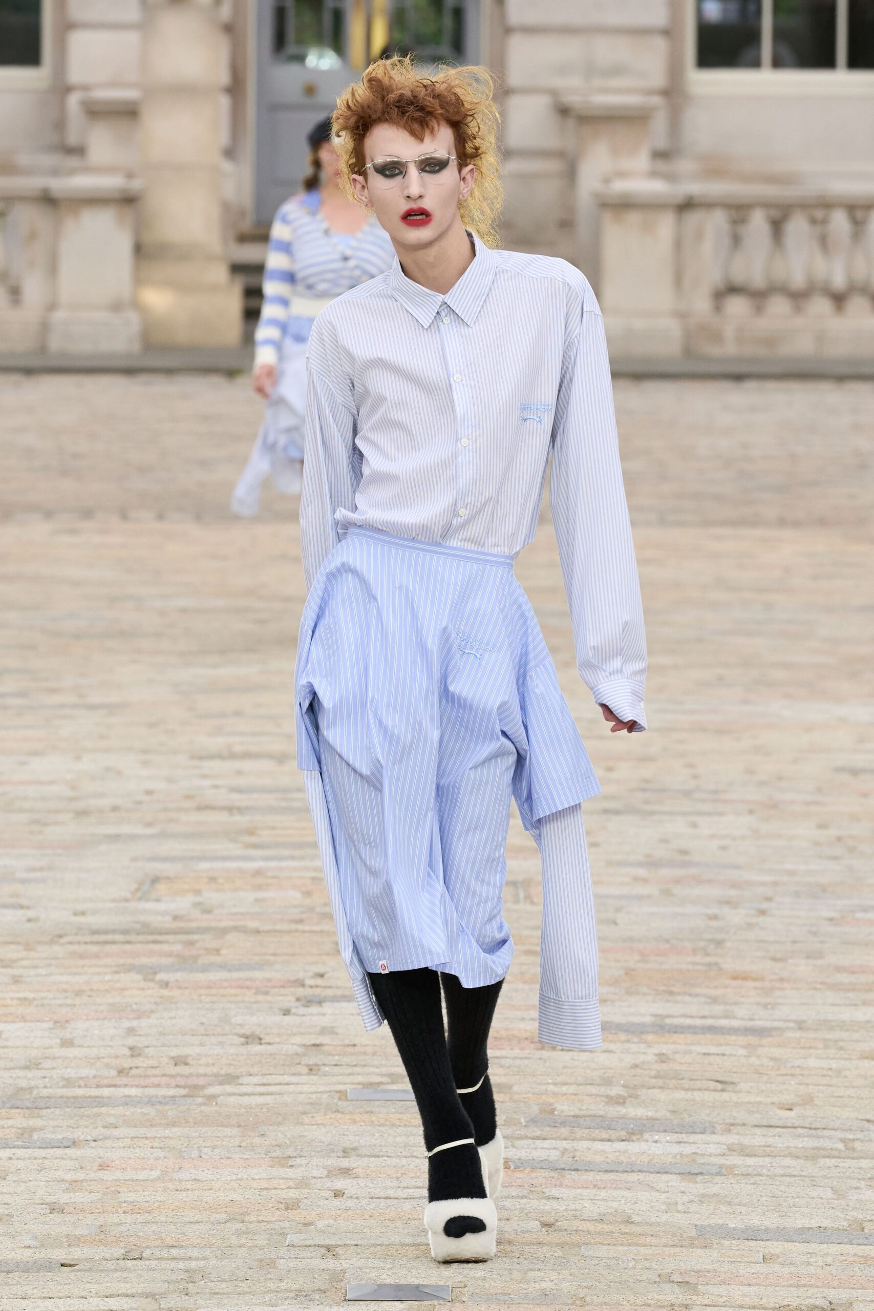 striped shirt and pleated pants