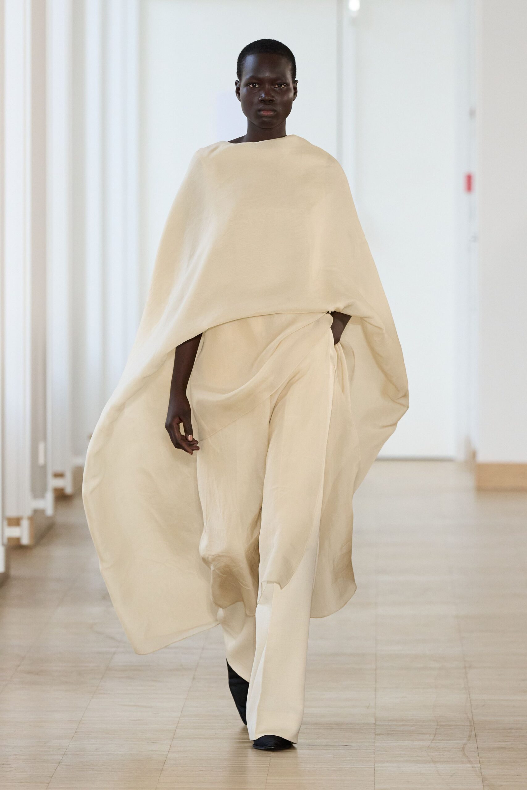 beige linen cape and pants