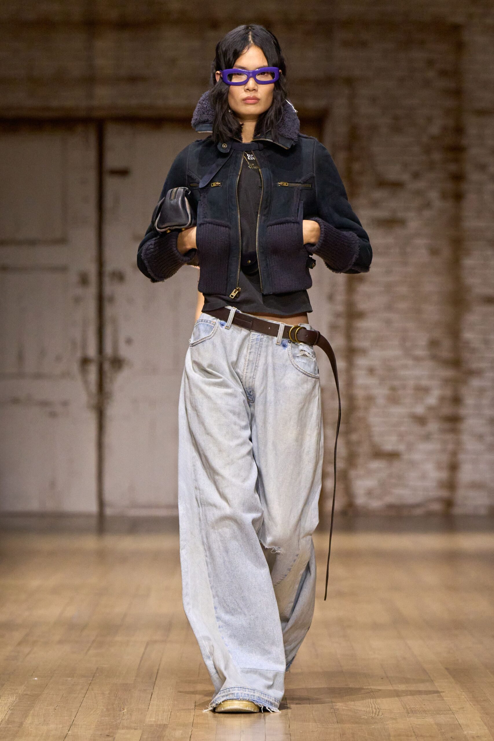 black fitted jacket with wide-leg jeans