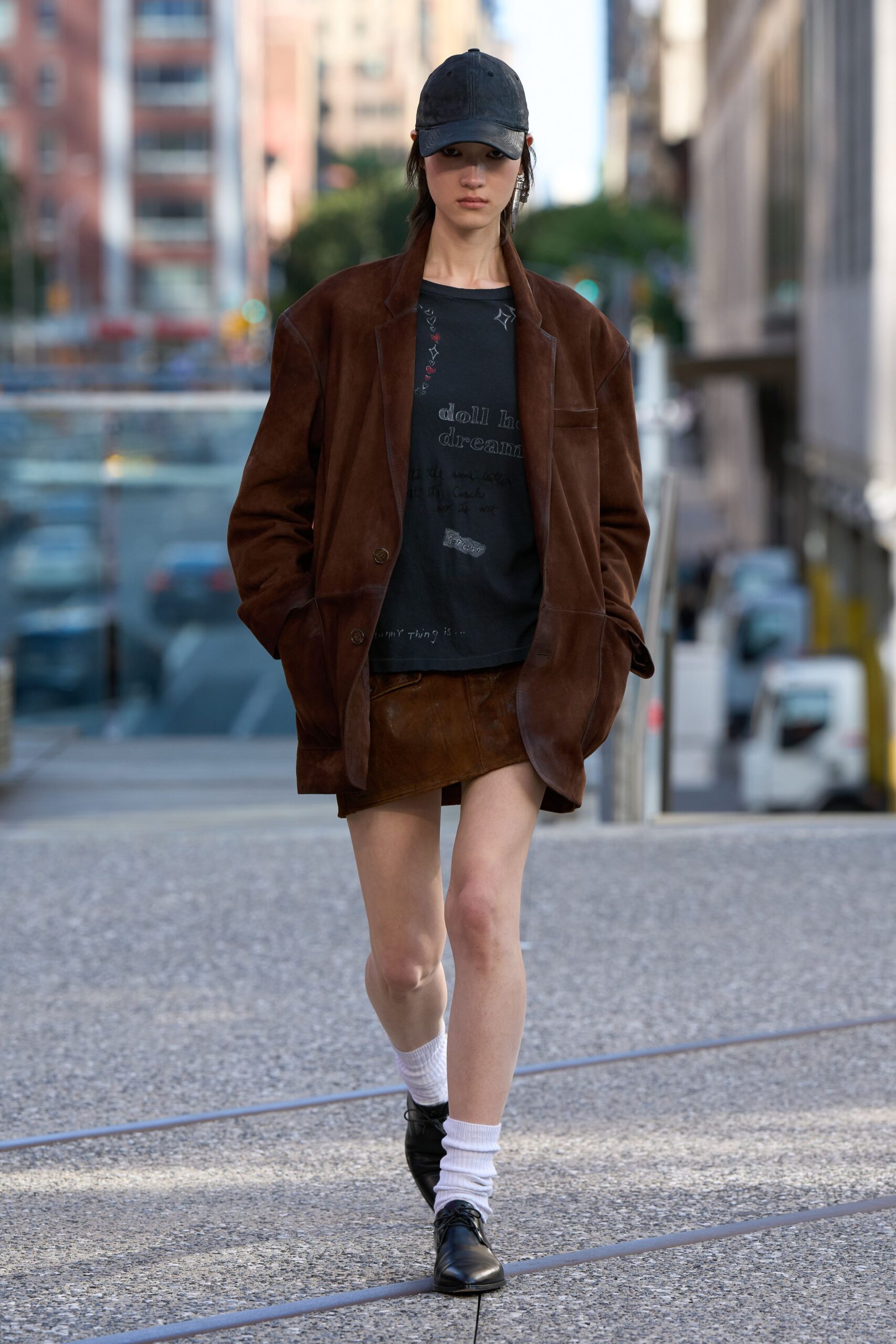 brown suede jacket black top
