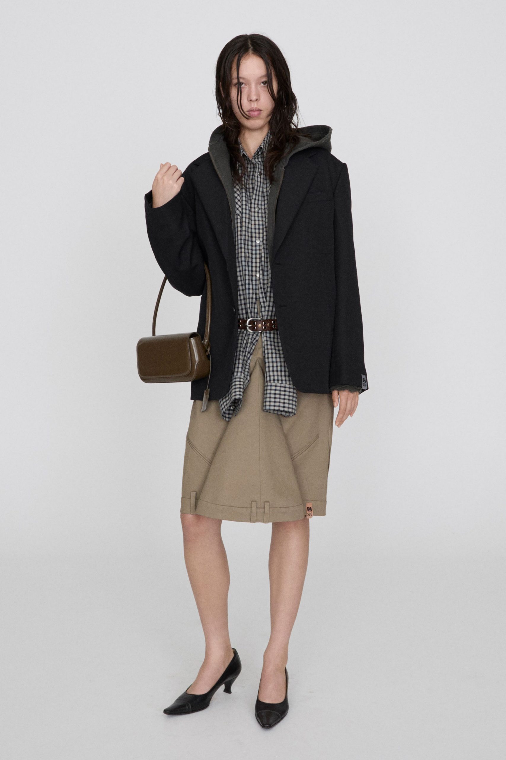 black wool coat with checked shirt