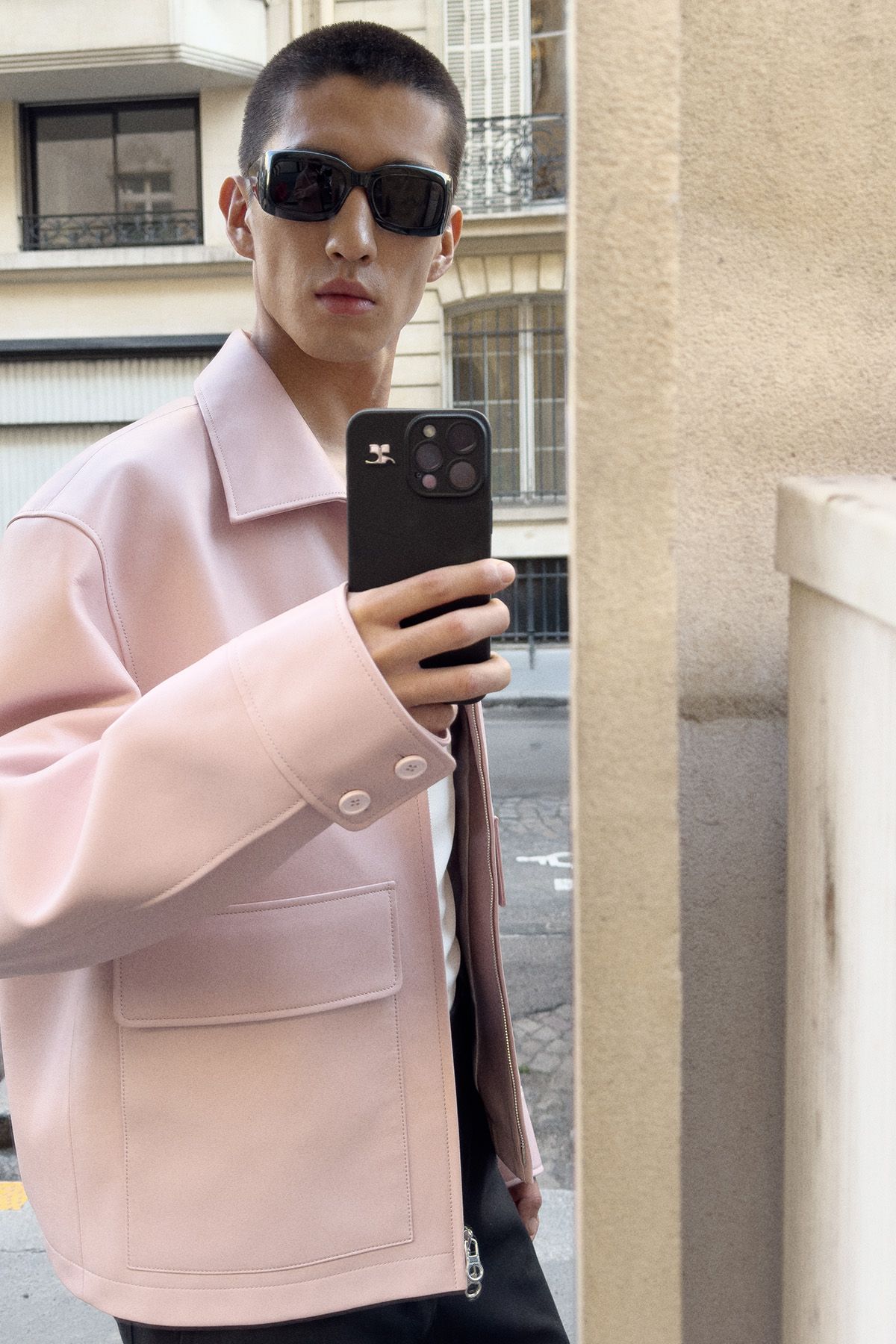 pink relaxed jacket with black pants