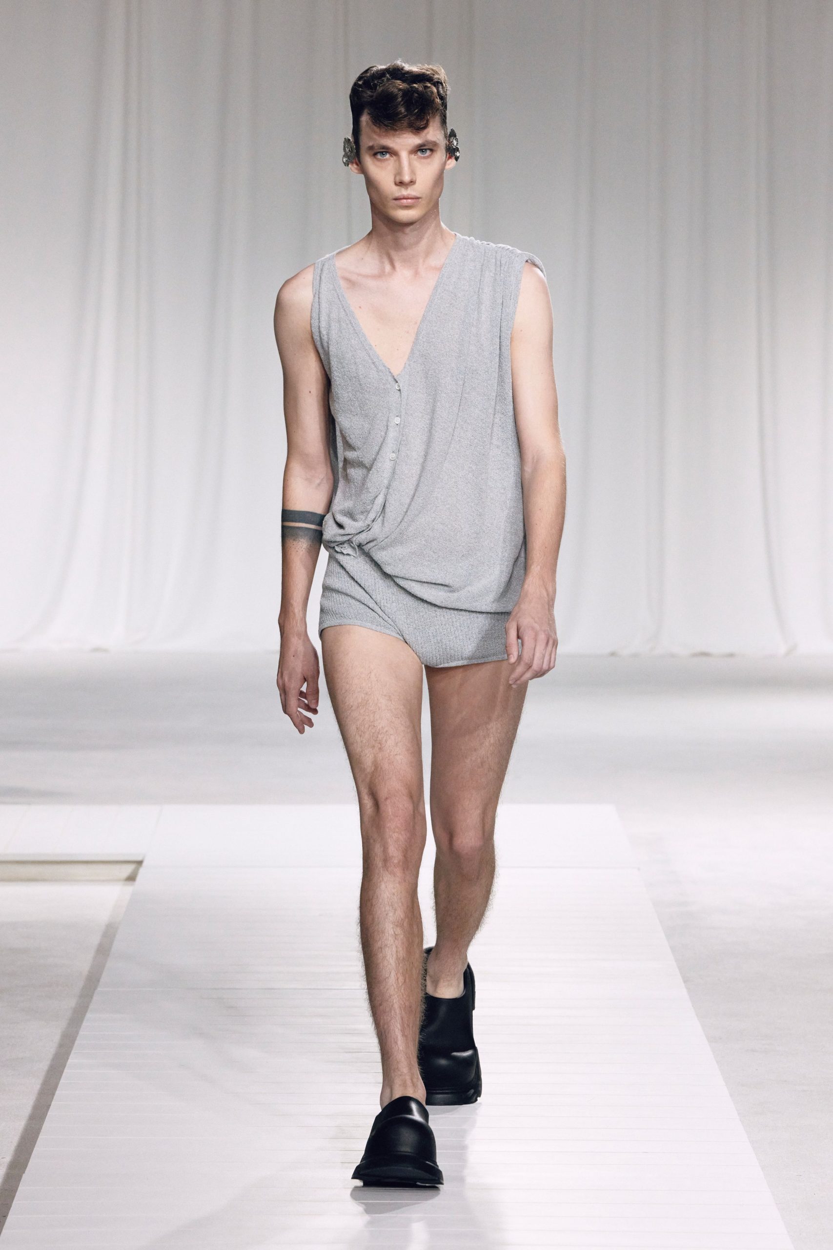 gray sleeveless bodysuit with black shoes