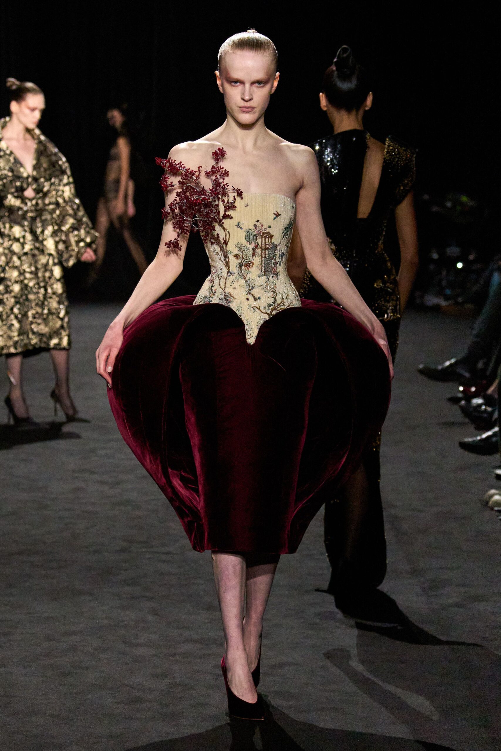 beige and red embellished gown