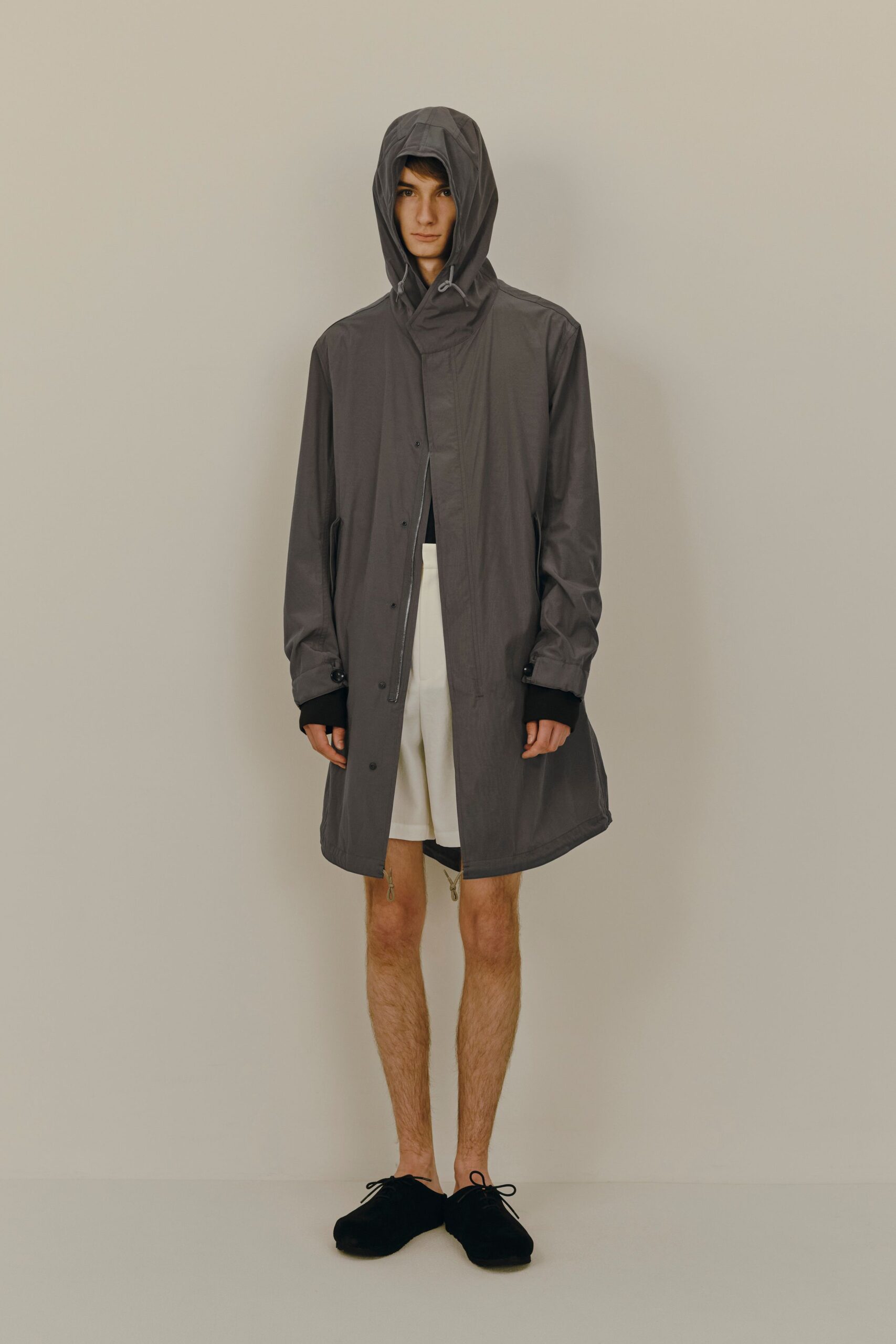 gray hooded coat with white shorts
