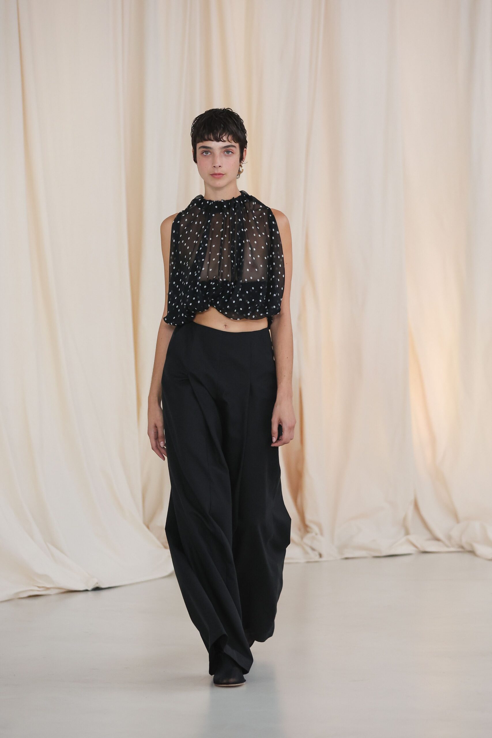 black silk sleeveless high-neck relaxed printed draped top