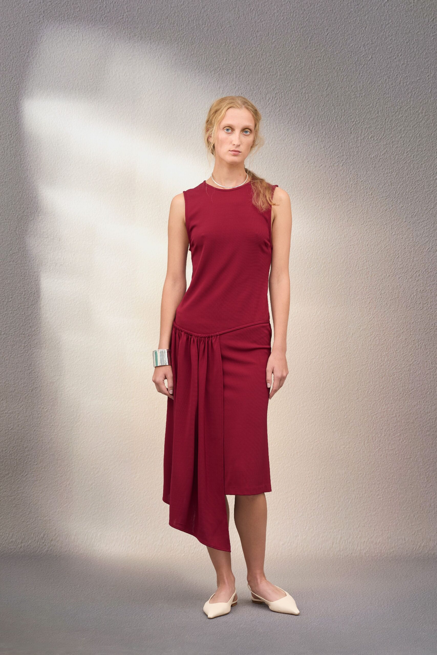 red cotton sleeveless high-neck fitted draped midi dress