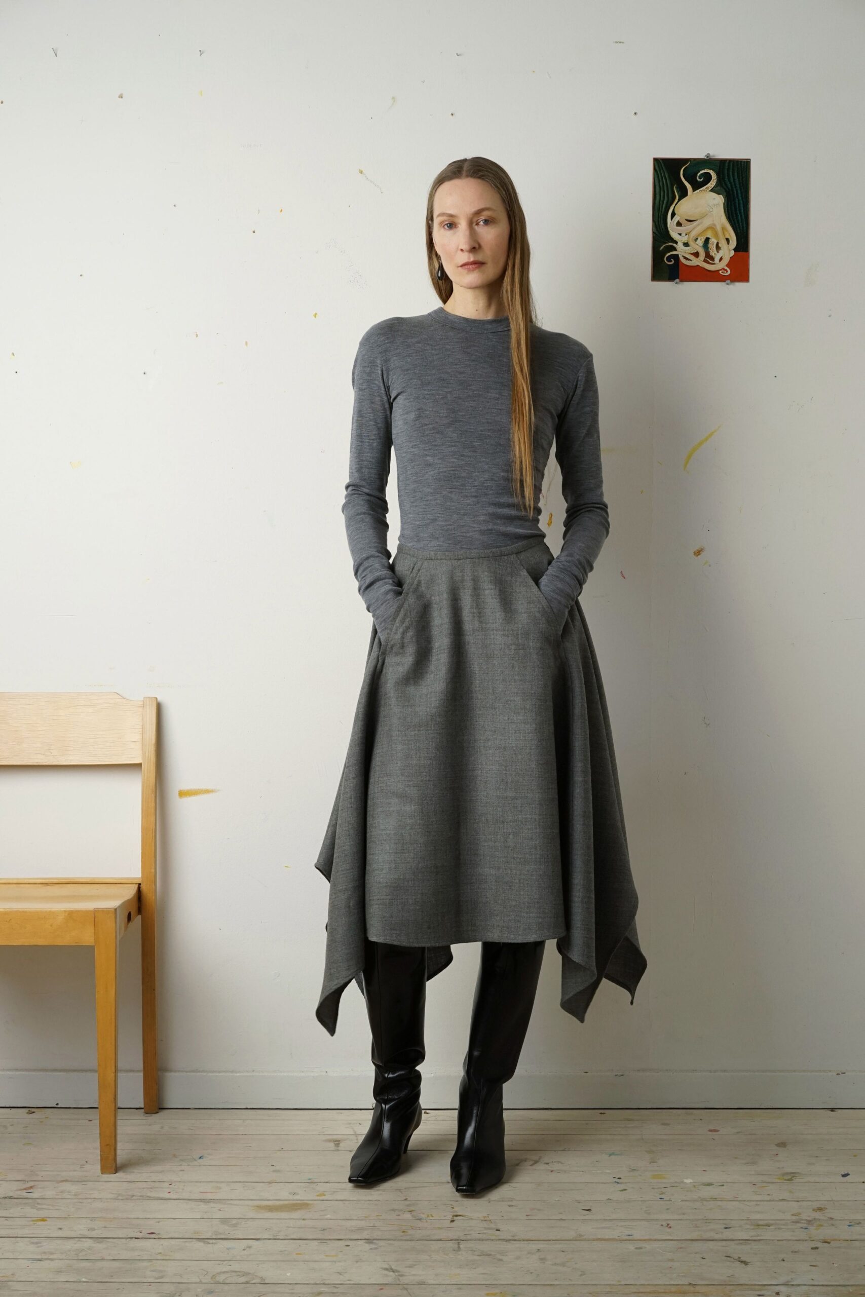 gray top with asymmetric skirt