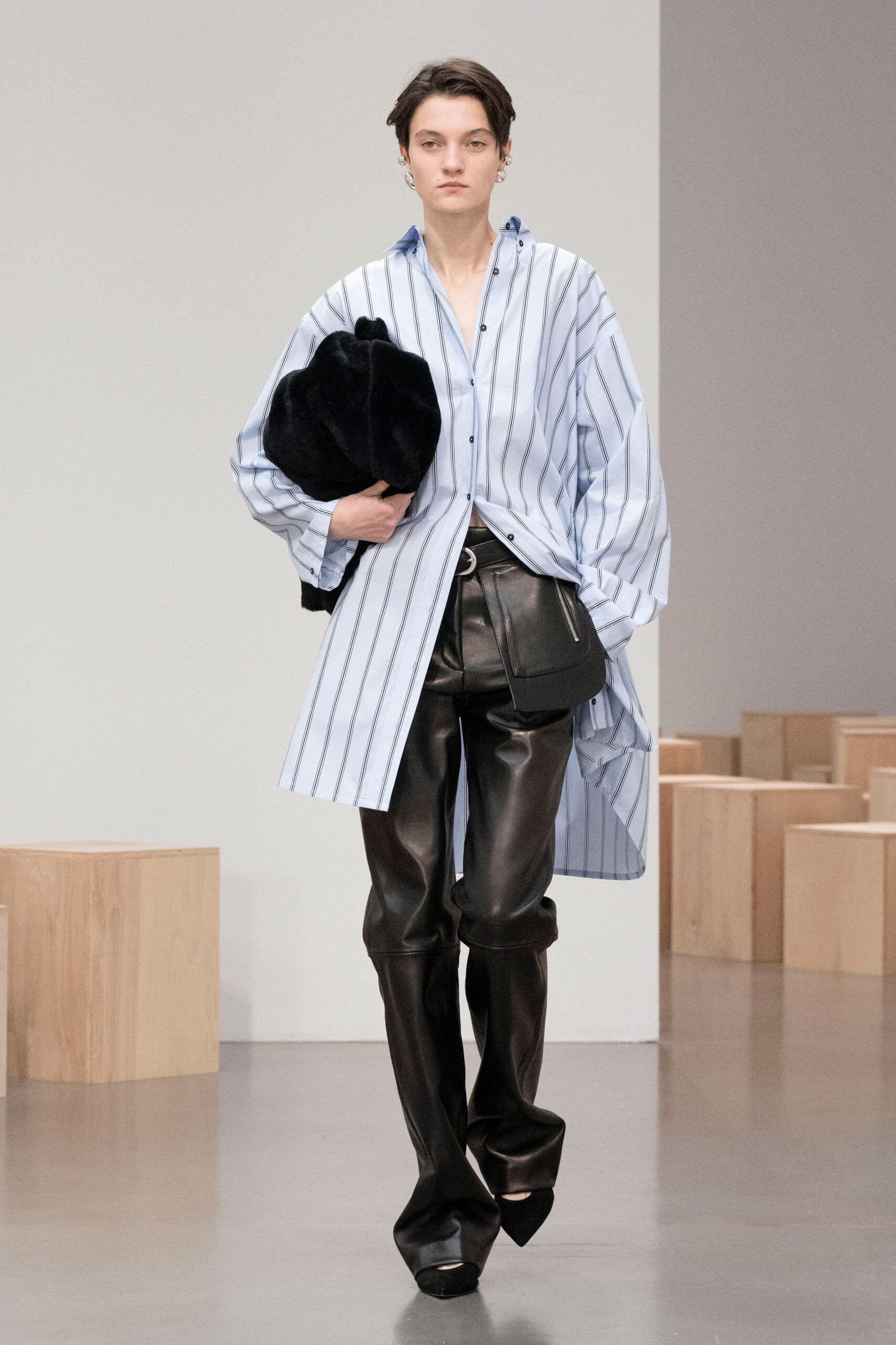 blue striped shirt black leather pants