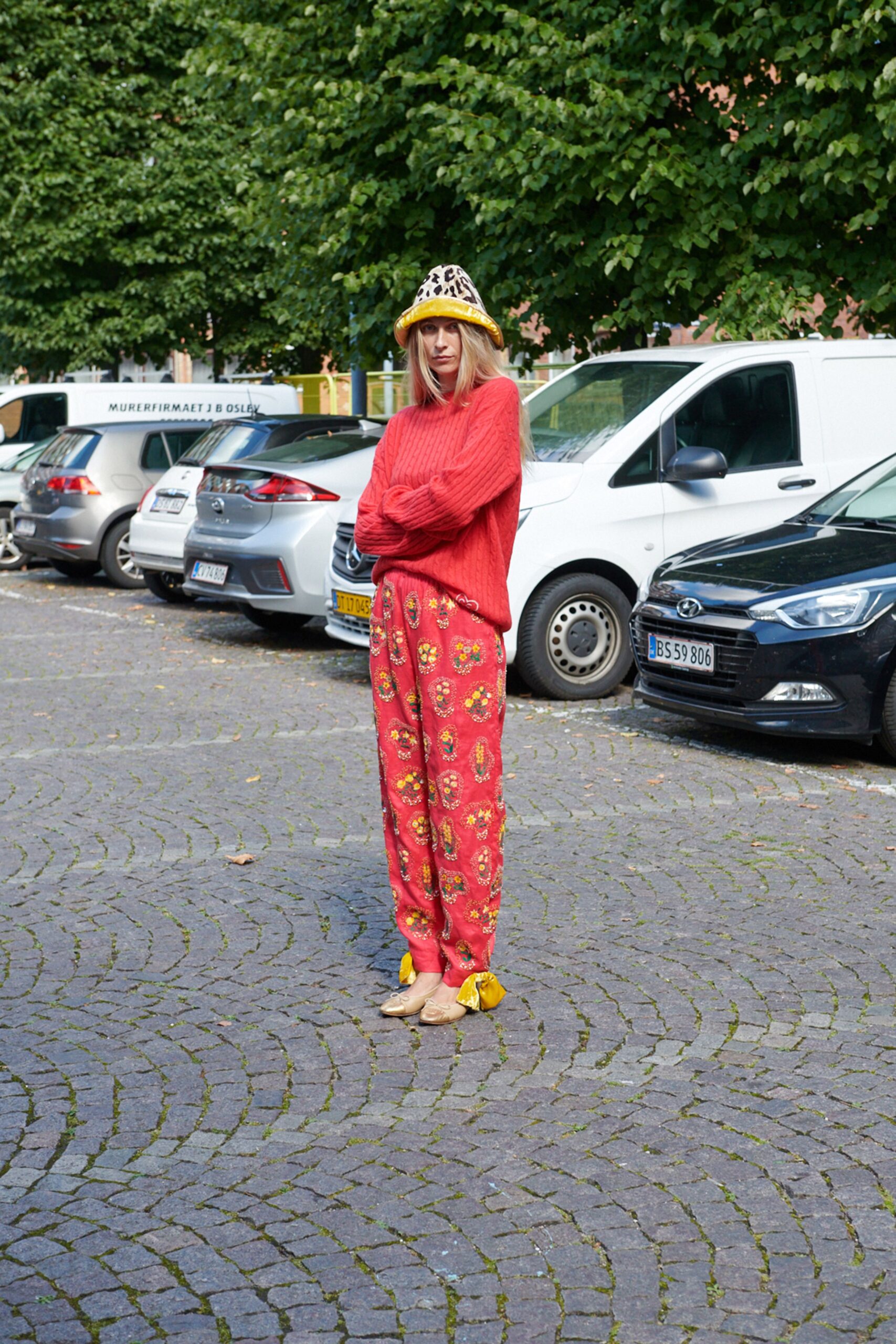 red relaxed sweater with printed pants