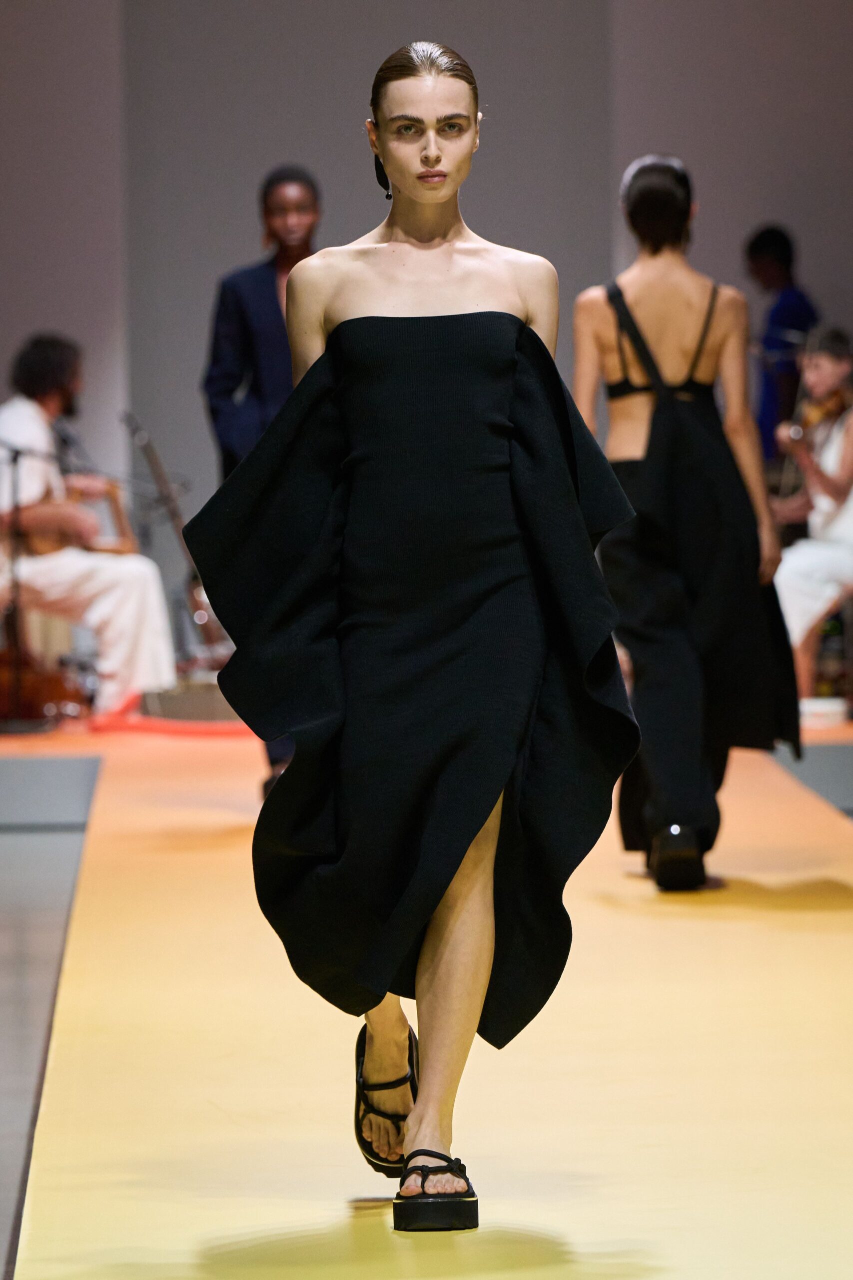 black cotton strapless slit fitted draped midi dress