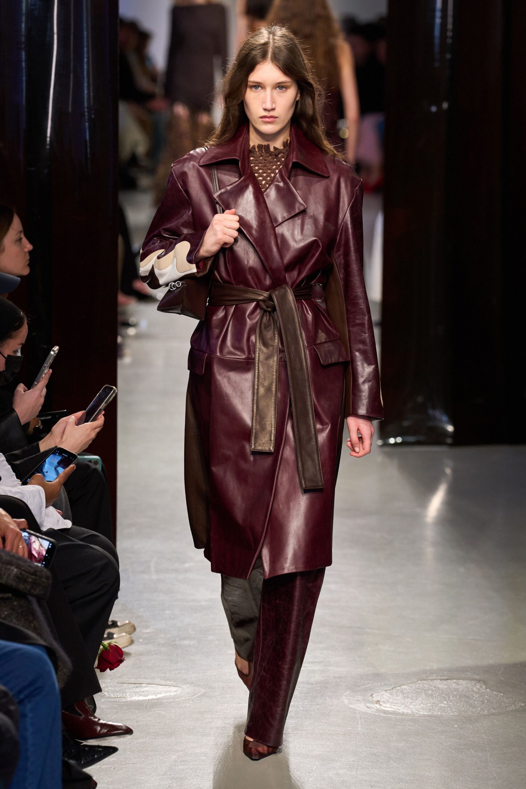 maroon leather long-sleeve collared fitted belted layered coat