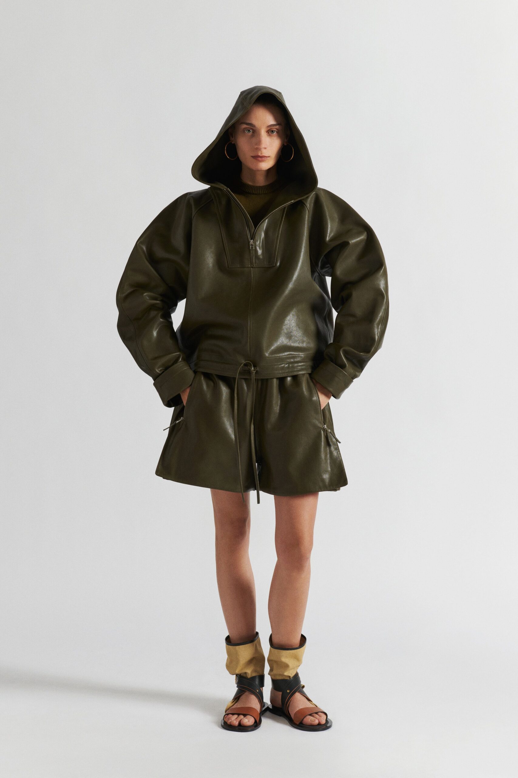 green leather oversized hoodie and skirt