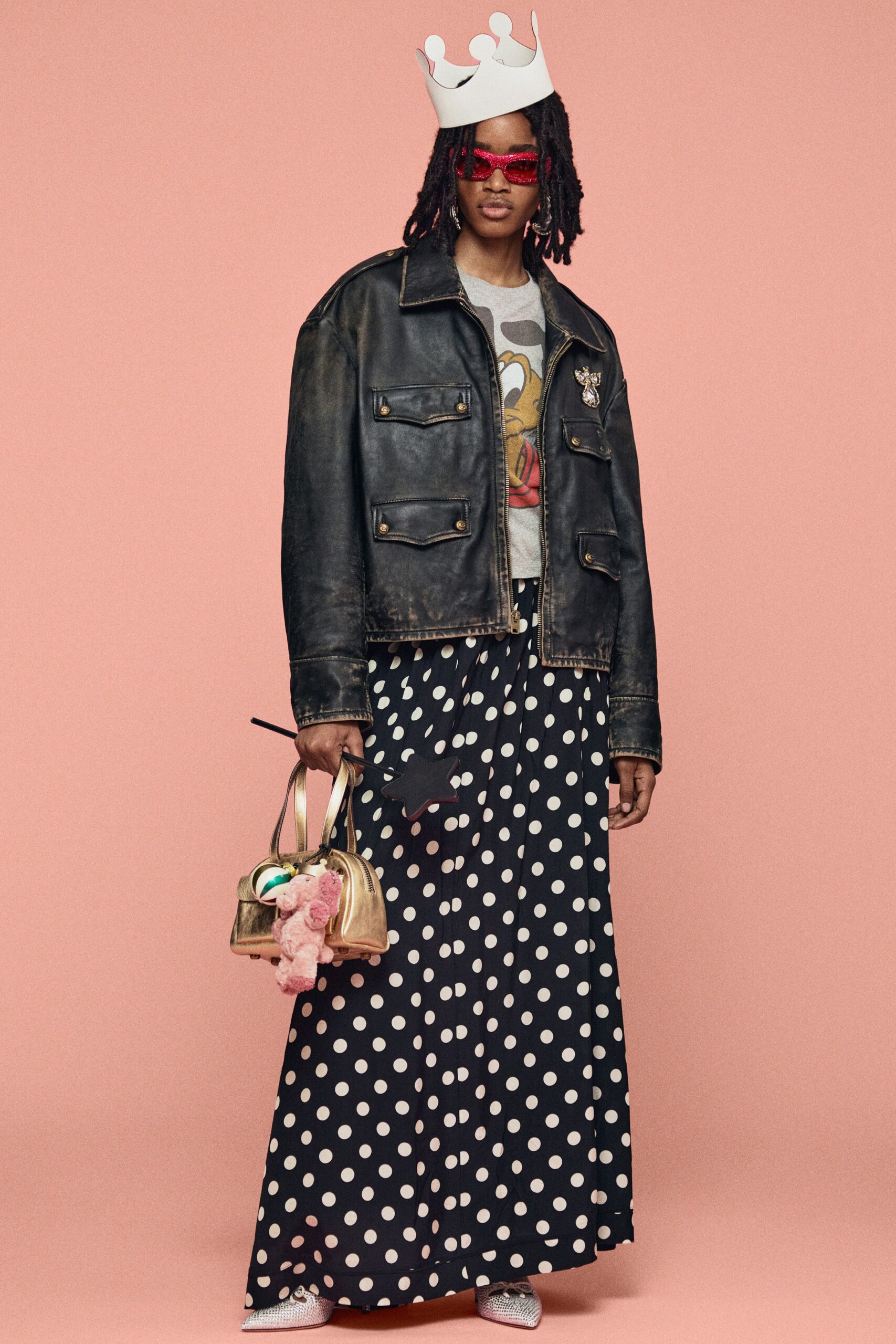black leather jacket with polka-dot skirt