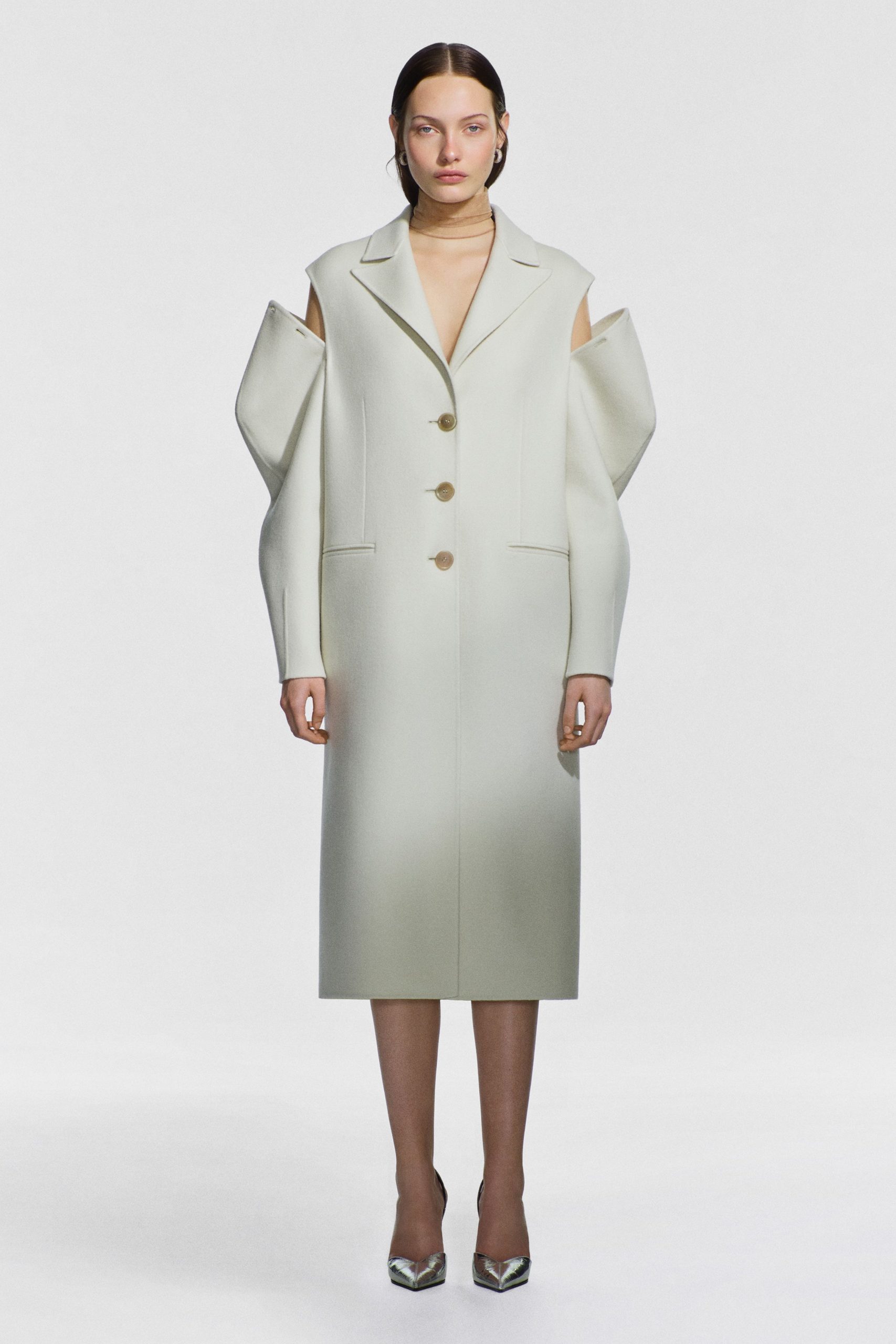 white wool long-sleeve collared structured buttoned midi coat