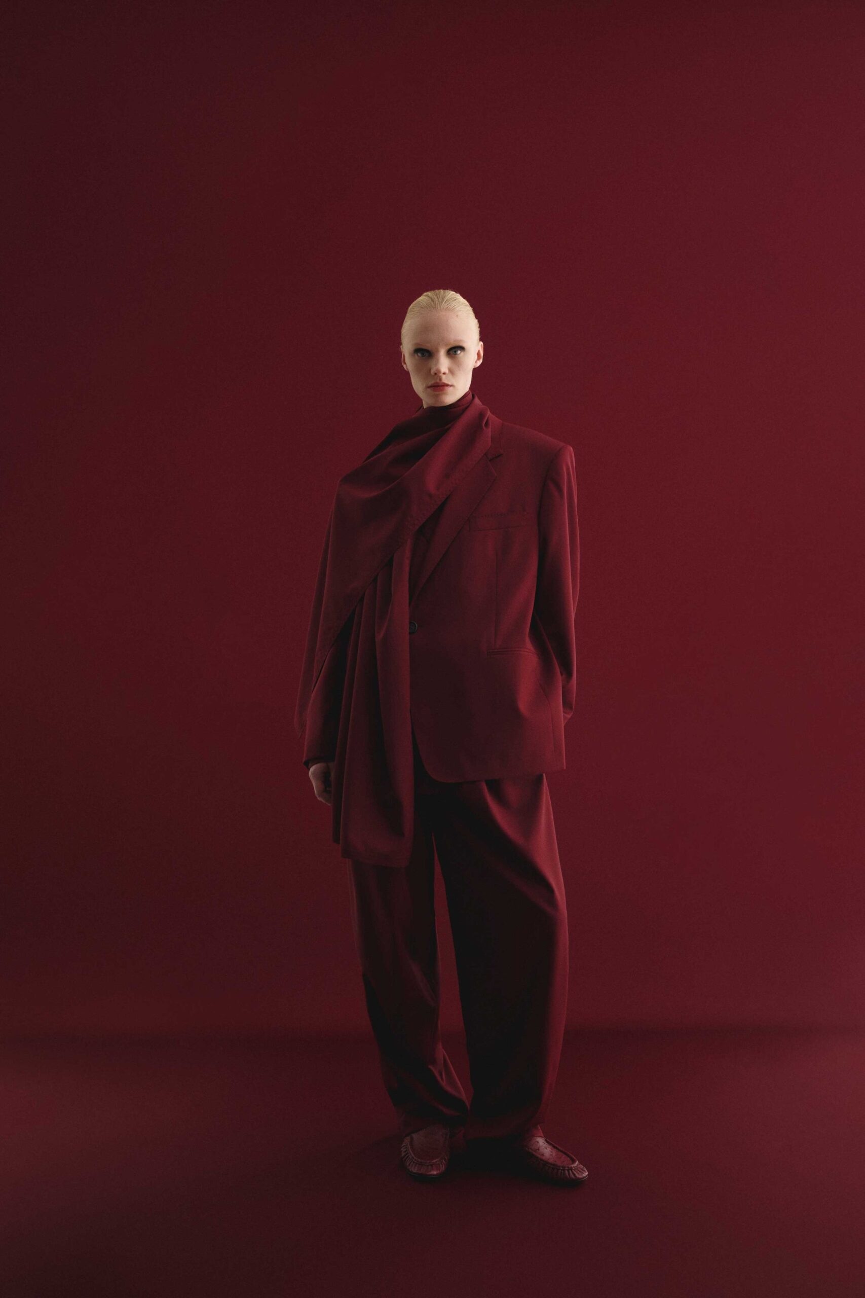red wool long-sleeve collared relaxed buttoned suit