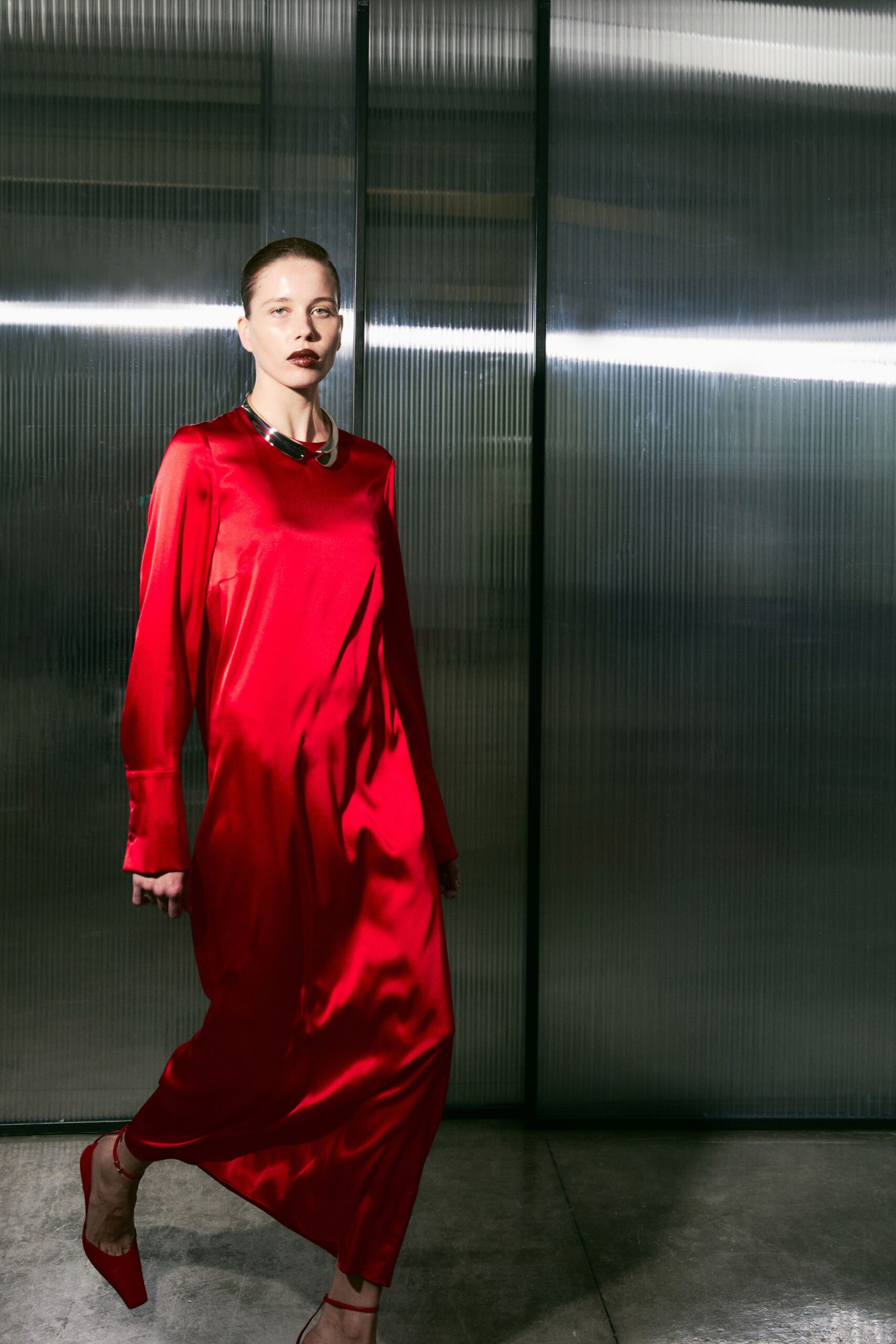 red satin long-sleeve high-neck relaxed draped shiny dress