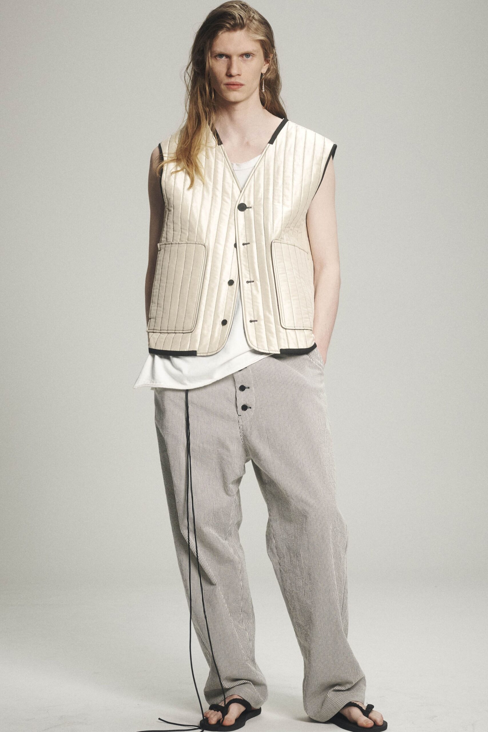 beige cotton relaxed high-waisted striped buttoned textured pants