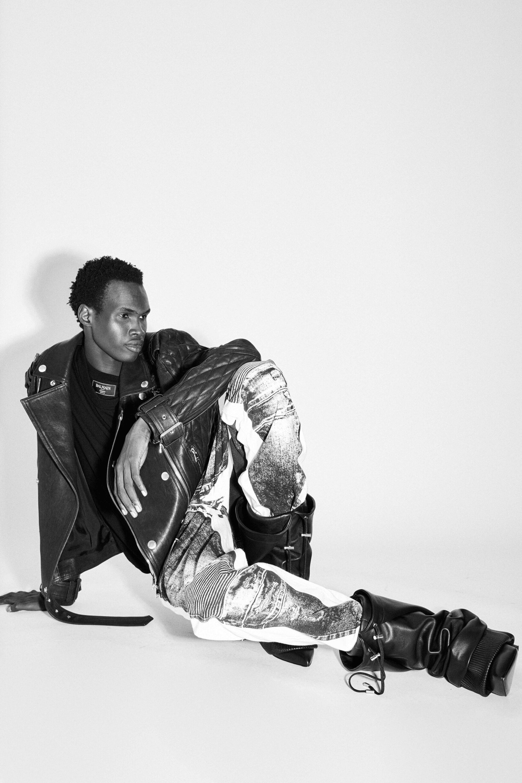 black leather jacket with distressed pants