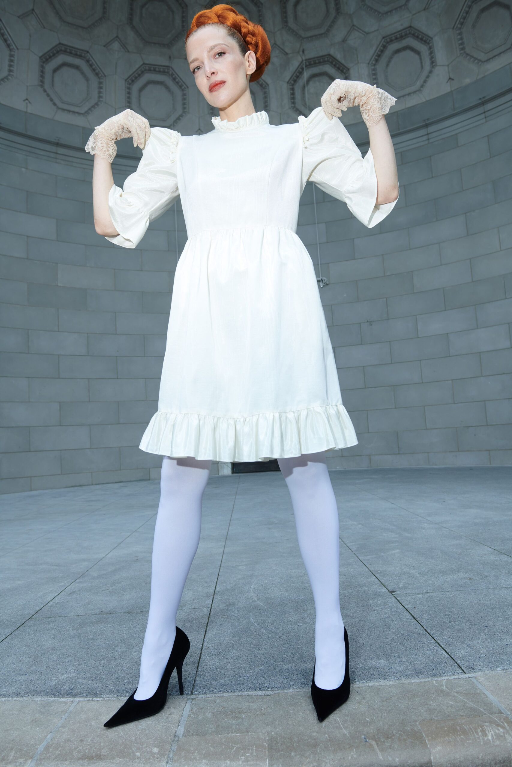white cotton long-sleeve high-neck structured ruffled layered dress