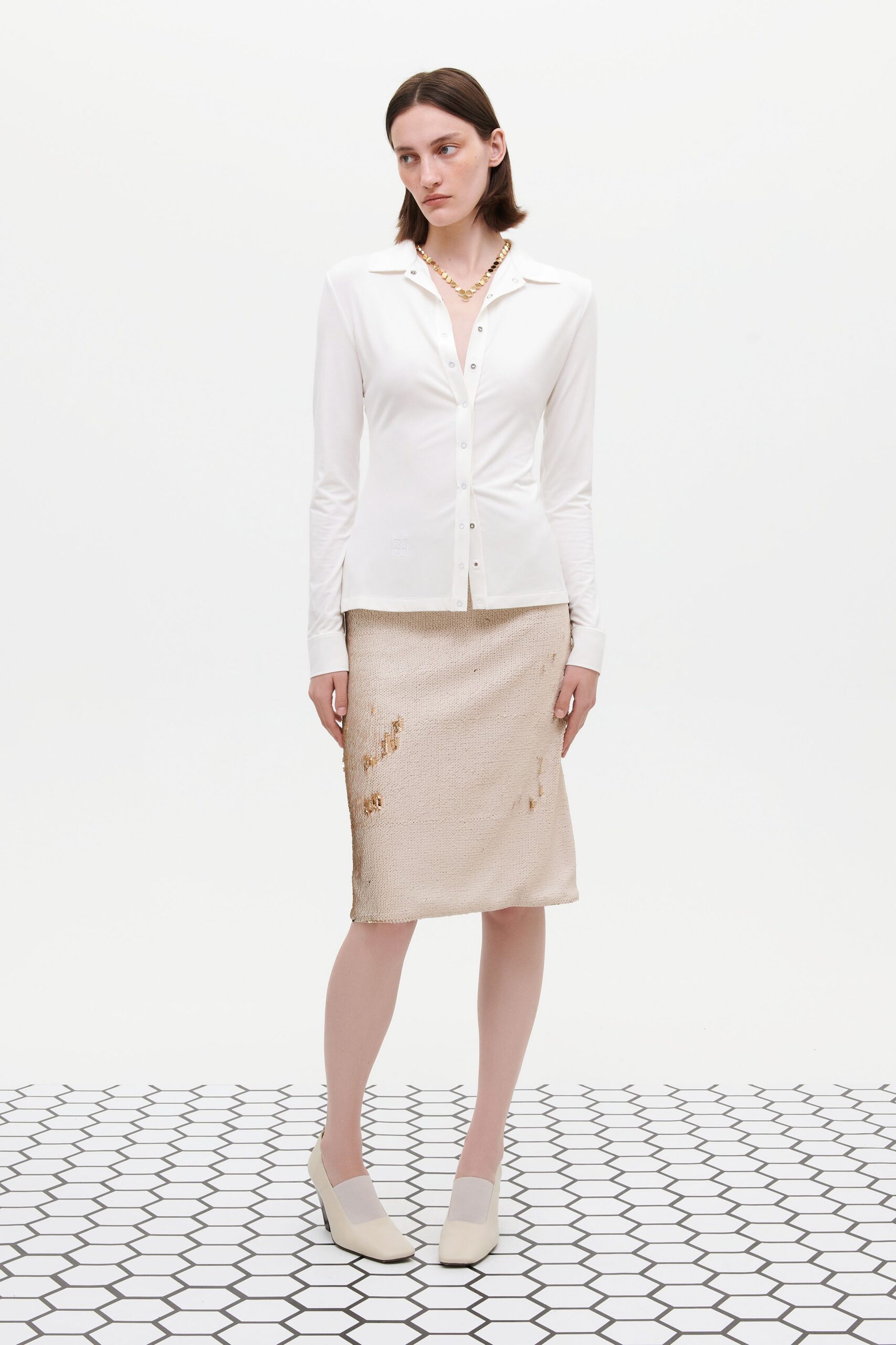 white fitted shirt beige skirt