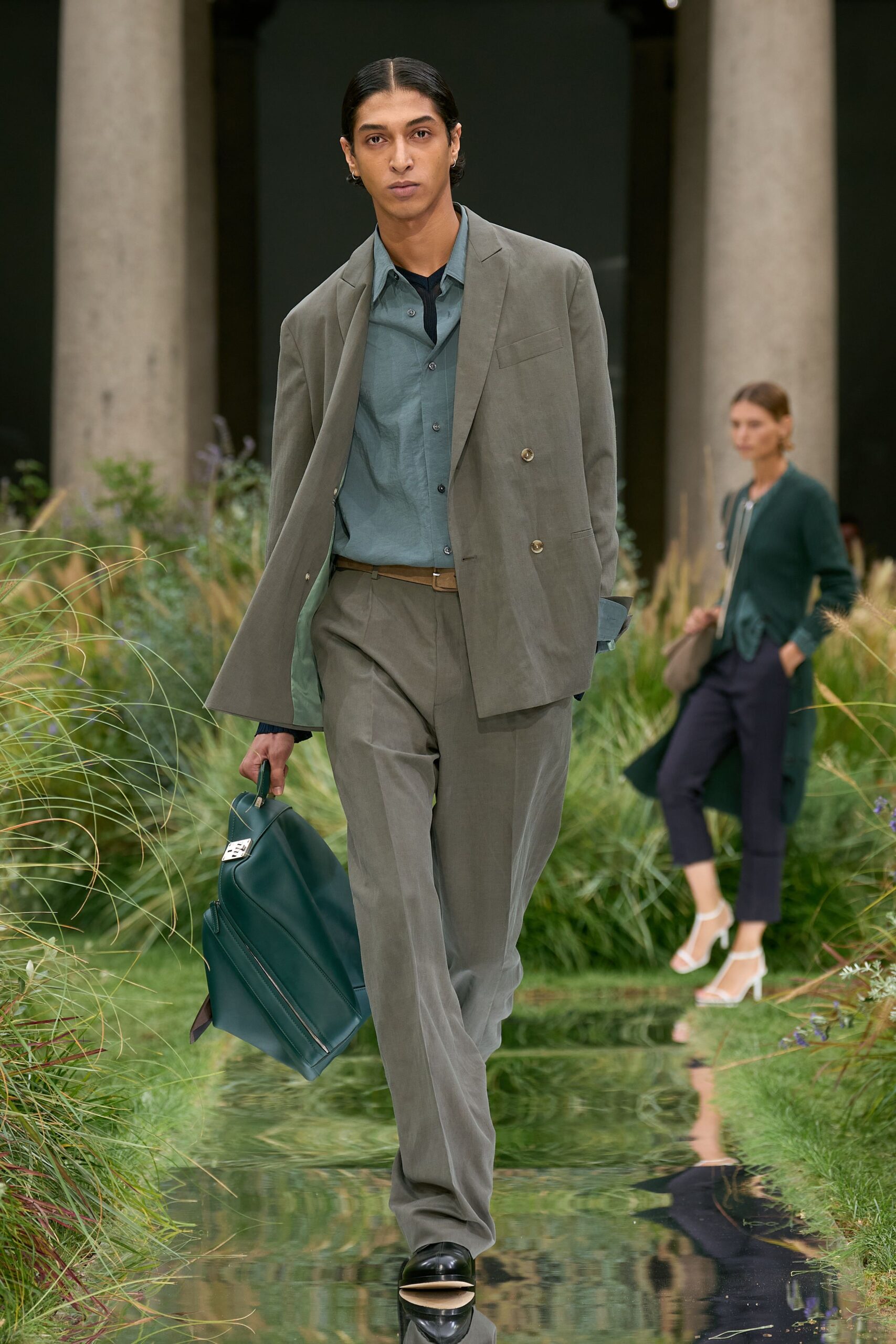 gray tailored suit with blue shirt